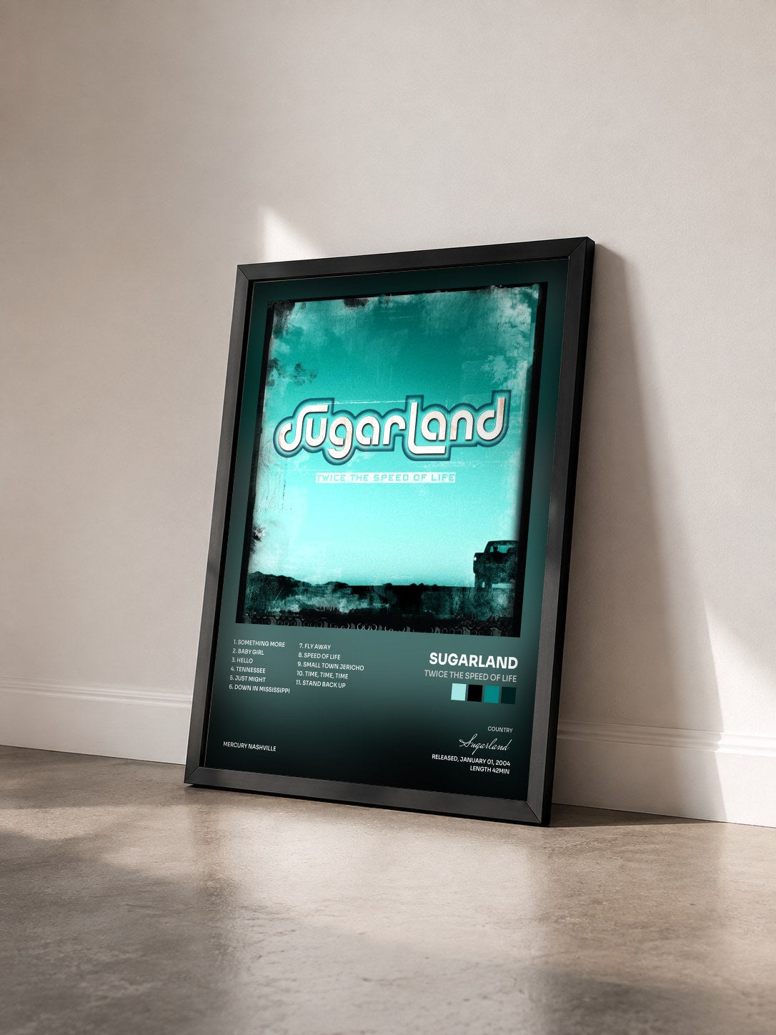 #noir Tableau de l'album Twice The Speed Of Life de Sugarland vu de trois quarts, cadre noir