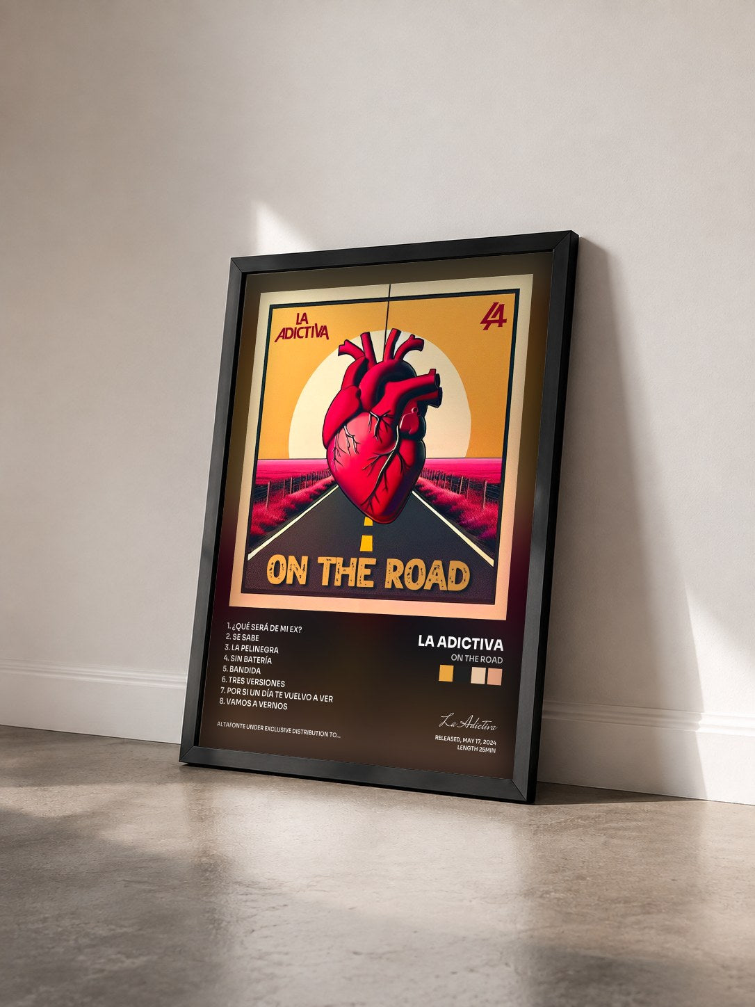 #noir Tableau de l'album On The Road de La Adictiva vu de trois quarts, cadre noir