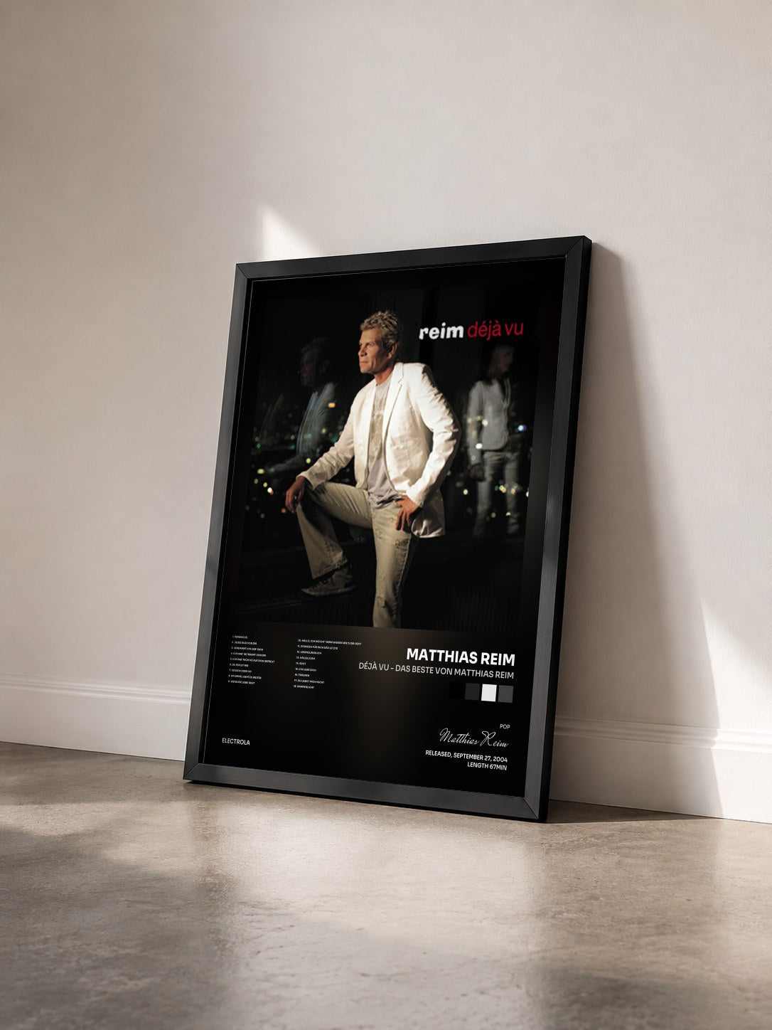 #noir Tableau de l'album Déjà Vu - Das Beste Von Matthias Reim de Matthias Reim vu de trois quarts, cadre noir