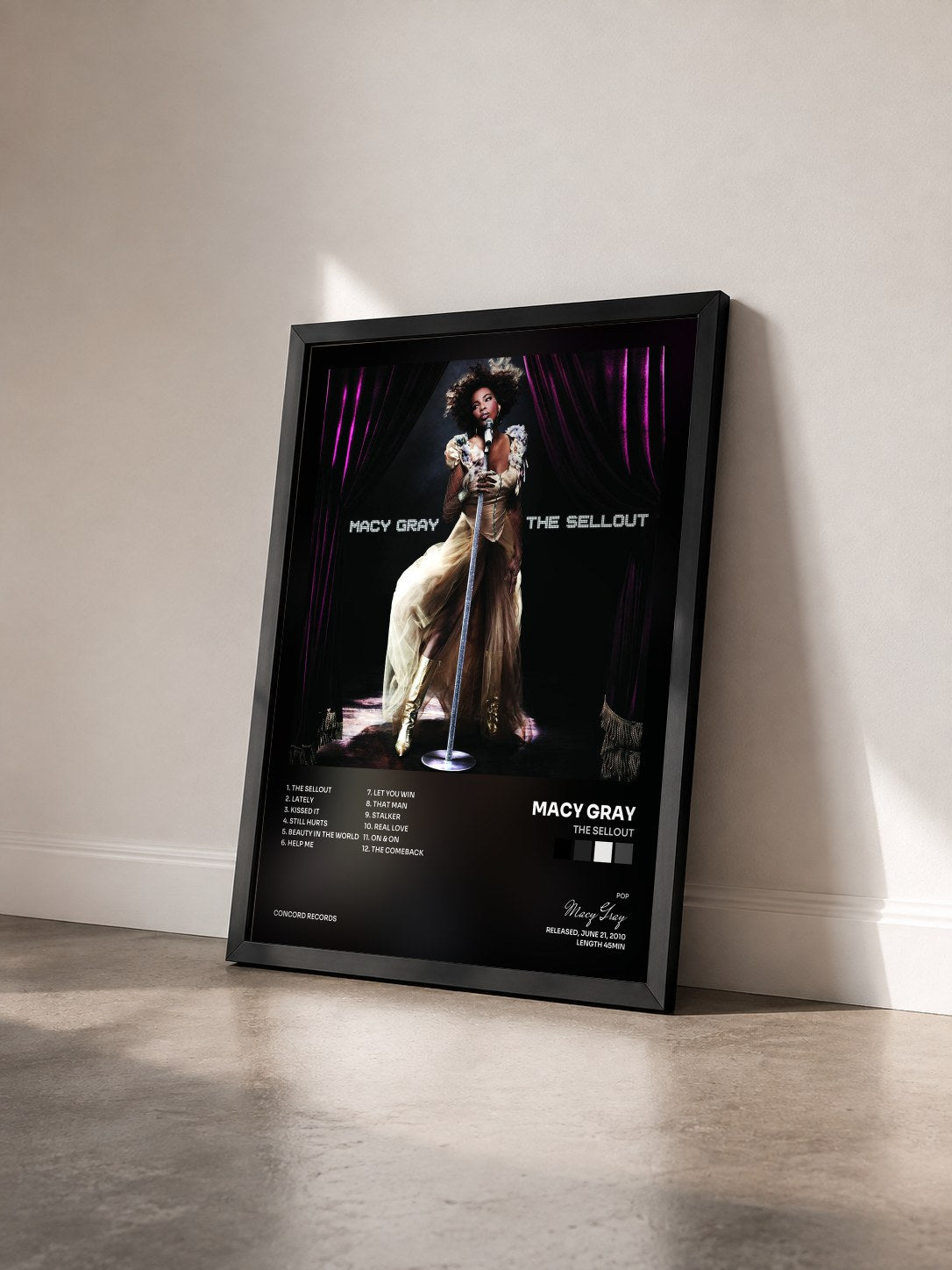 #noir Tableau de l'album The Sellout de Macy Gray vu de trois quarts, cadre noir