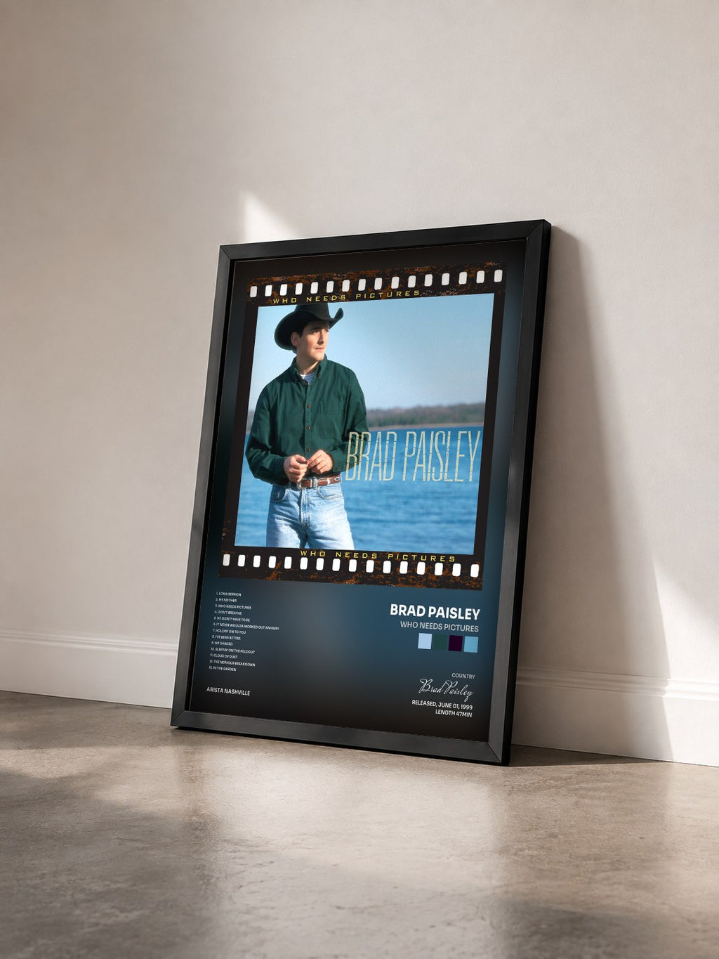 #noir Tableau de l'album Who Needs Pictures de Brad Paisley vu de trois quarts, cadre noir