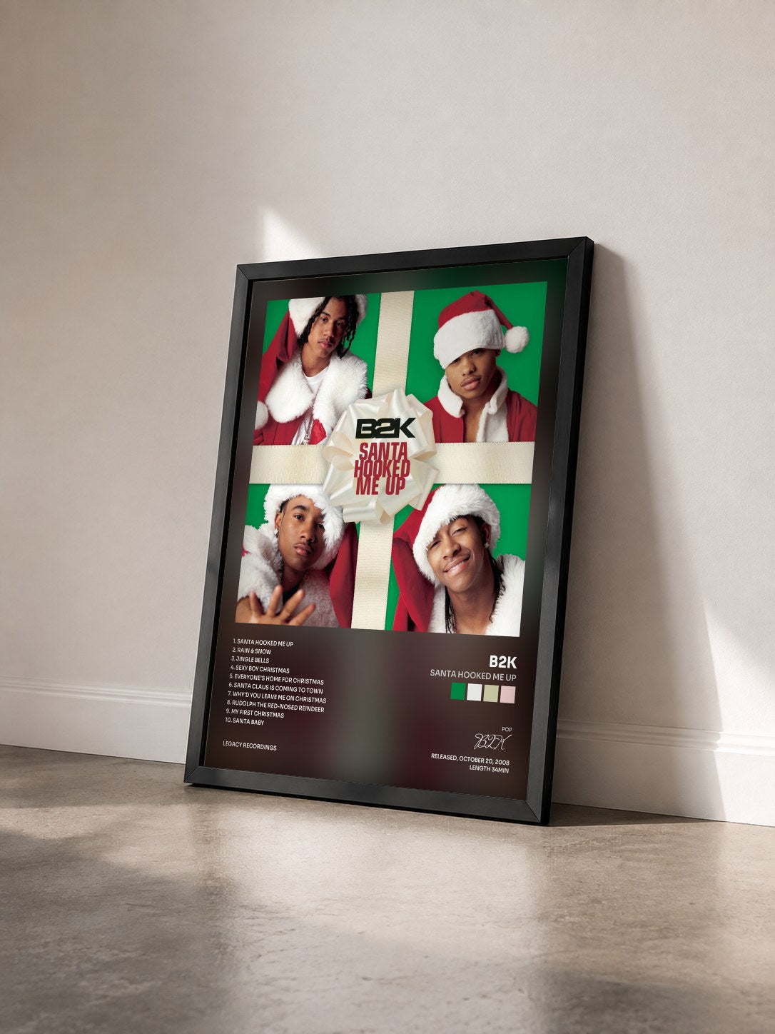 #noir Tableau de l'album Santa Hooked Me Up de B2K vu de trois quarts, cadre noir