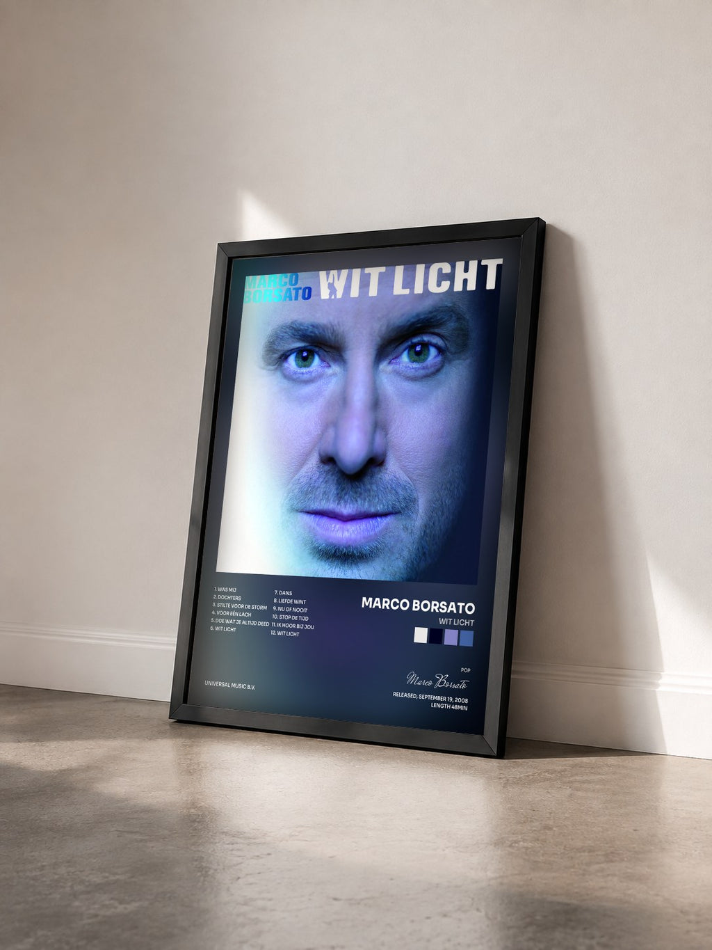#noir Tableau de l'album Wit Licht de Marco Borsato vu de trois quarts, cadre noir
