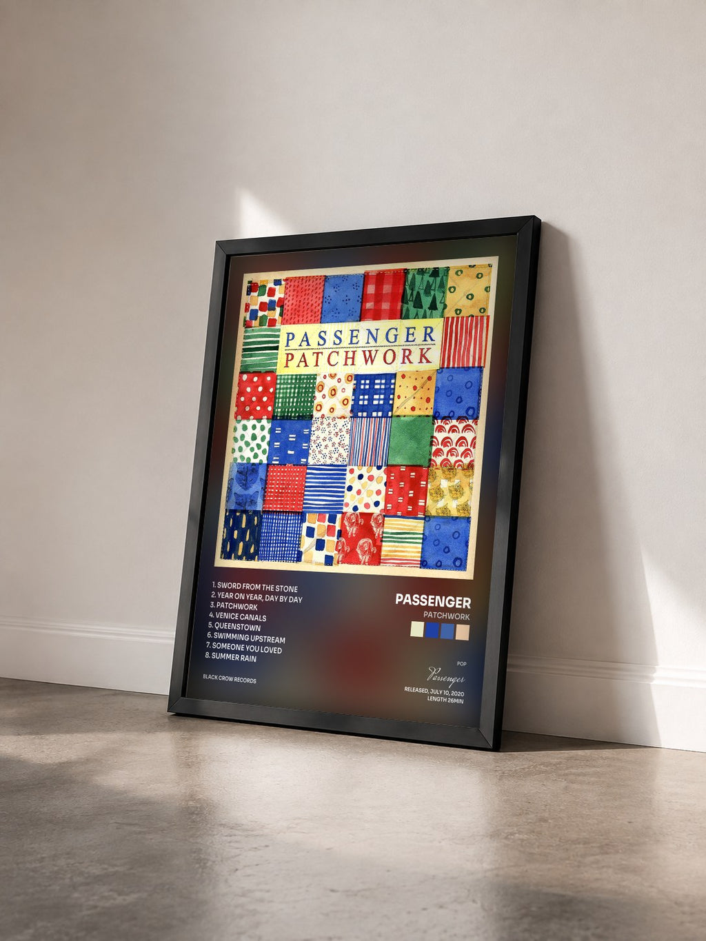 #noir Tableau de l'album Patchwork de Passenger vu de trois quarts, cadre noir