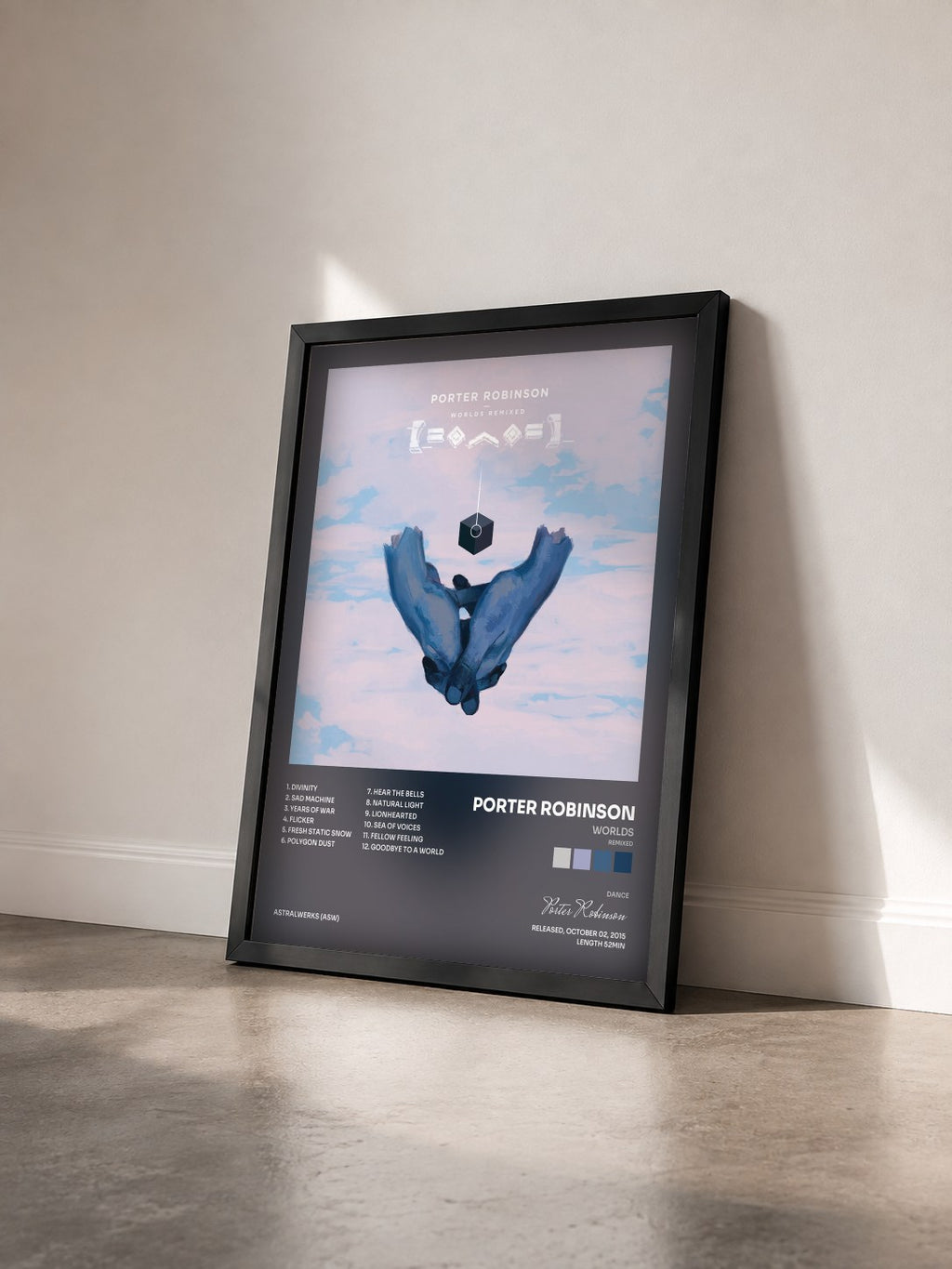 #noir Tableau de l'album Worlds (Remixed) de Porter Robinson vu de trois quarts, cadre noir