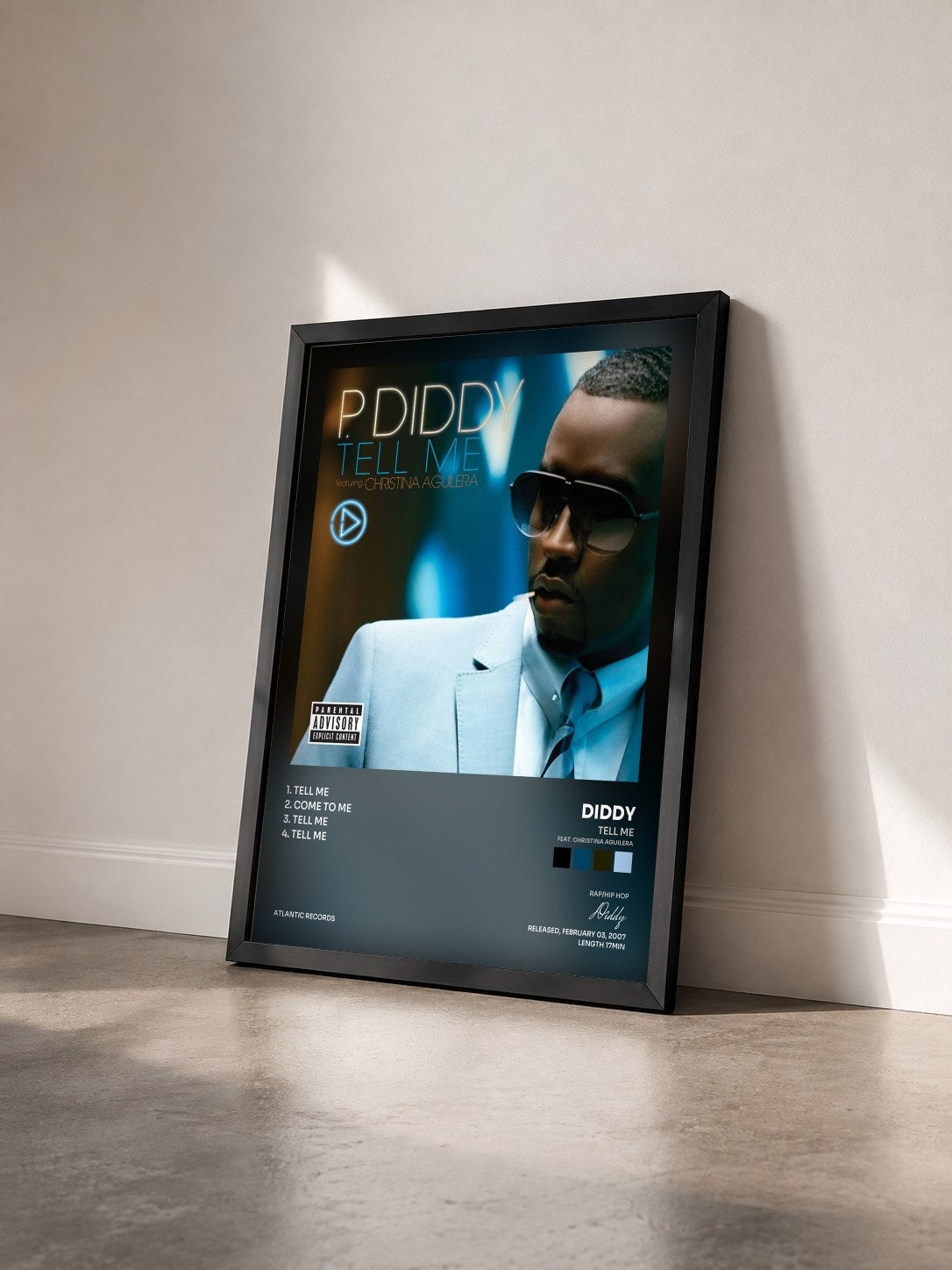 #noir Tableau de l'album Tell Me (feat. Christina Aguilera) de Diddy vu de trois quarts, cadre noir