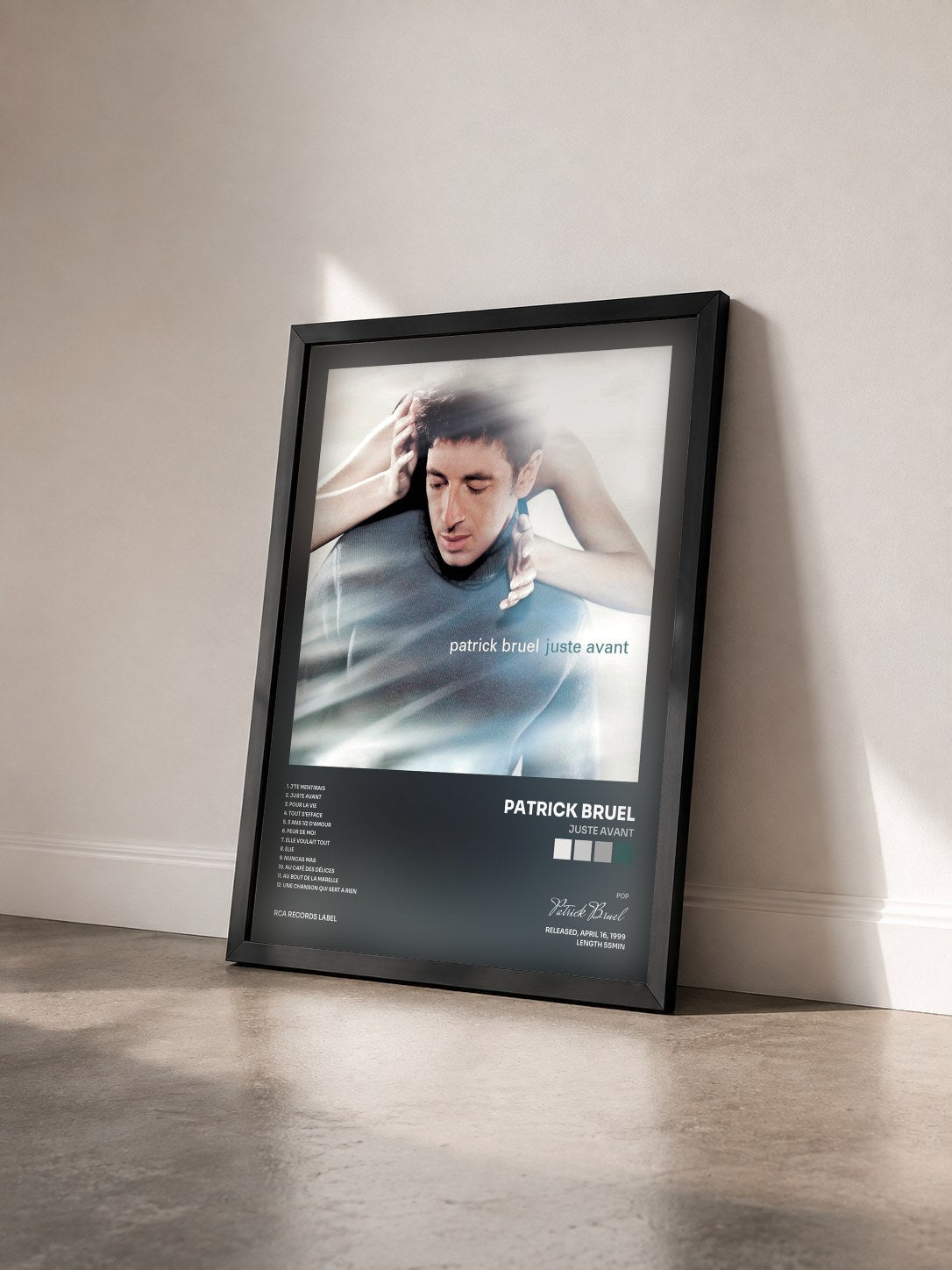 #noir Tableau de l'album Juste Avant de Patrick Bruel vu de trois quarts, cadre noir