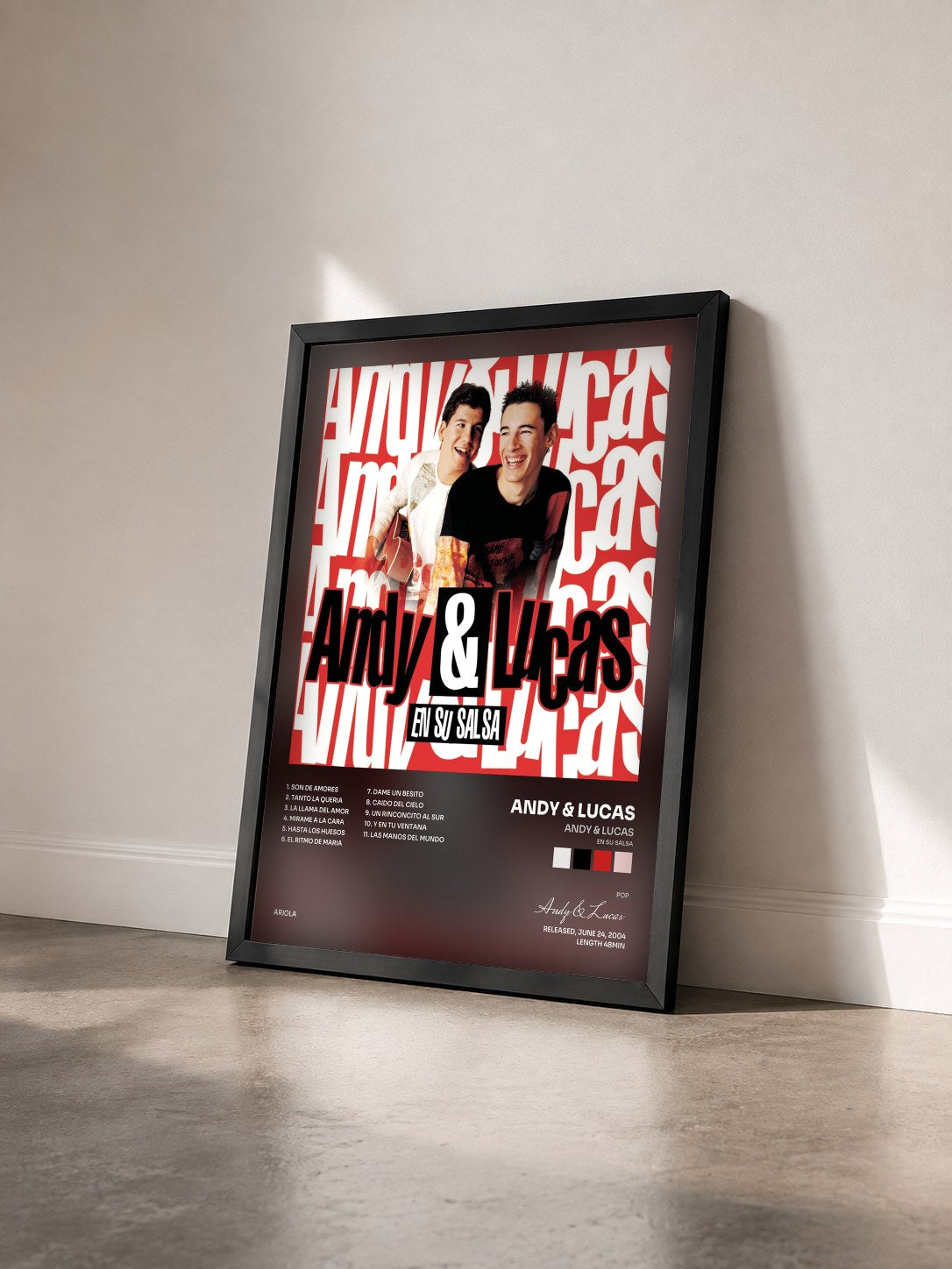 #noir Tableau de l'album Andy & Lucas (En Su Salsa) de Andy & Lucas vu de trois quarts, cadre noir
