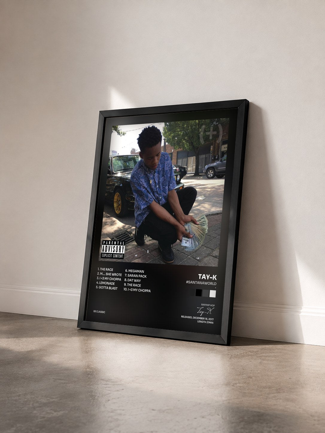 #noir Tableau de l'album #SantanaWorld (+) de Tay-K vu de trois quarts, cadre noir