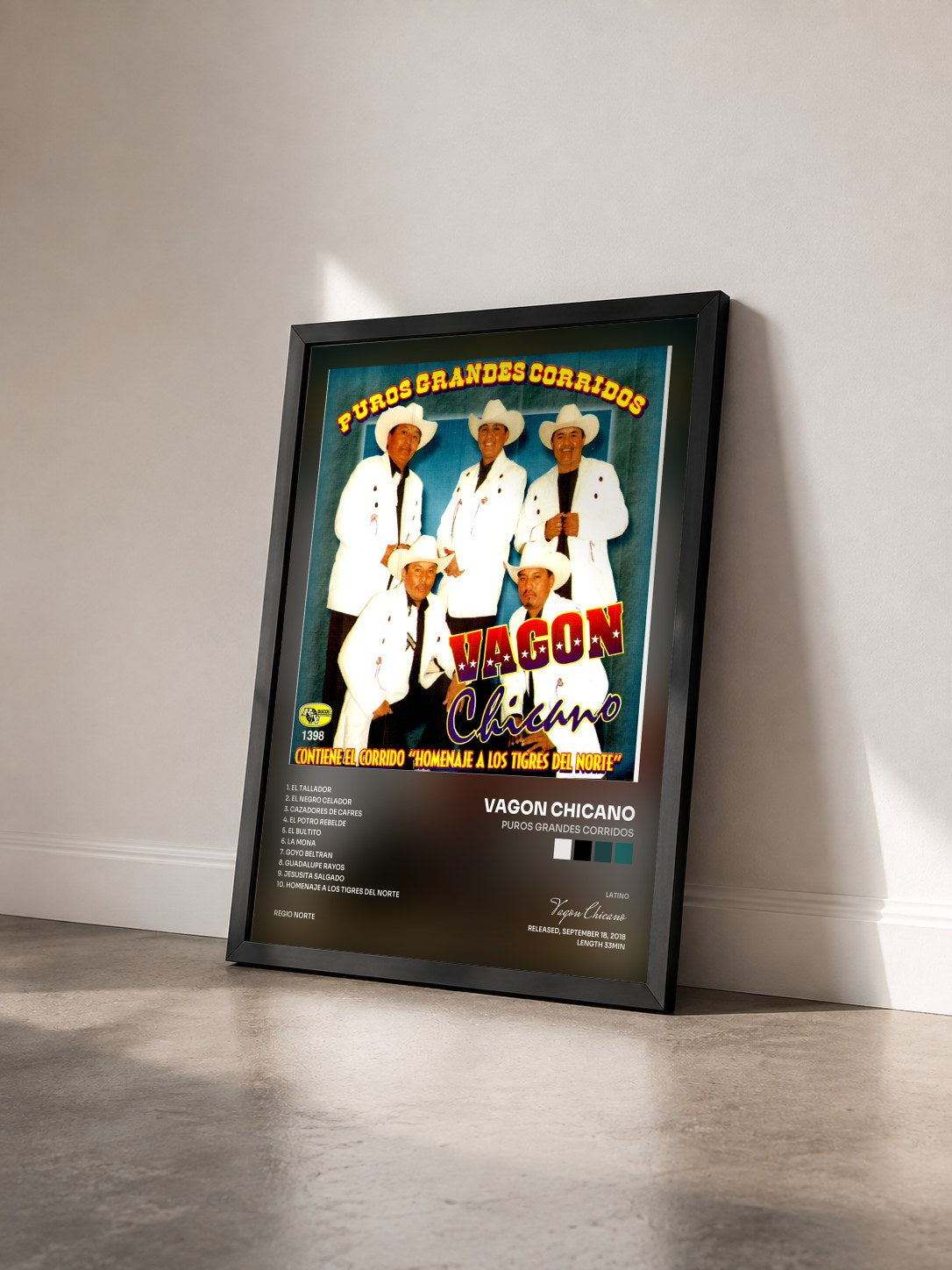 #noir Tableau de l'album Puros Grandes Corridos de Vagon Chicano vu de trois quarts, cadre noir