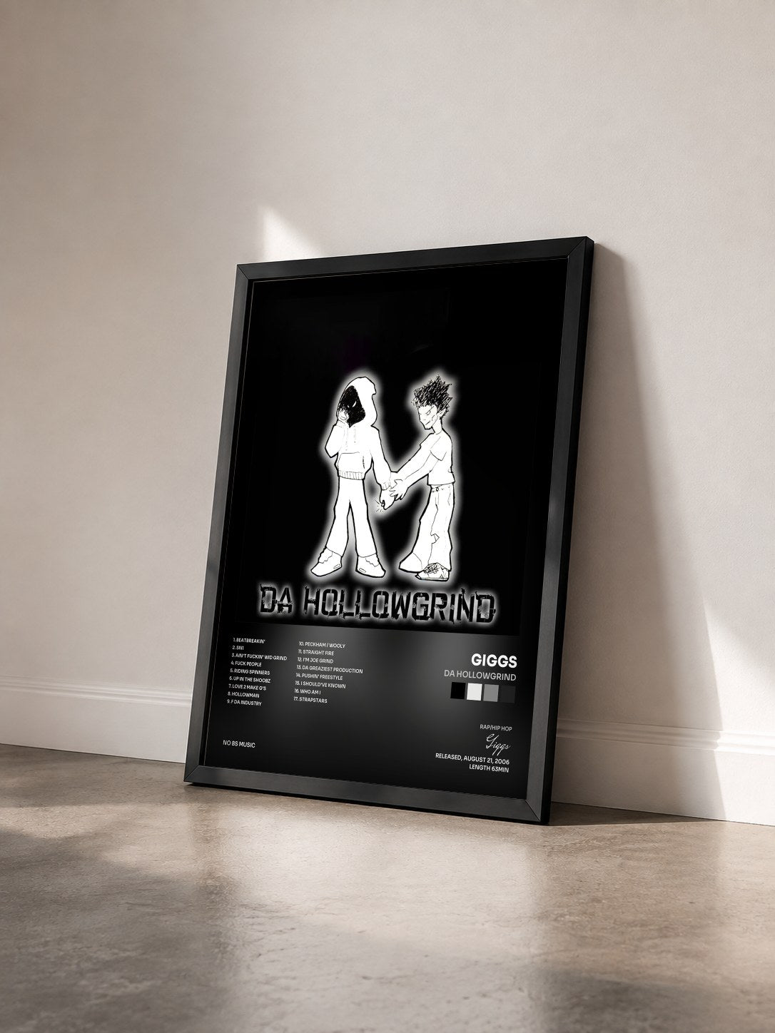 #noir Tableau de l'album Da Hollowgrind de Giggs vu de trois quarts, cadre noir