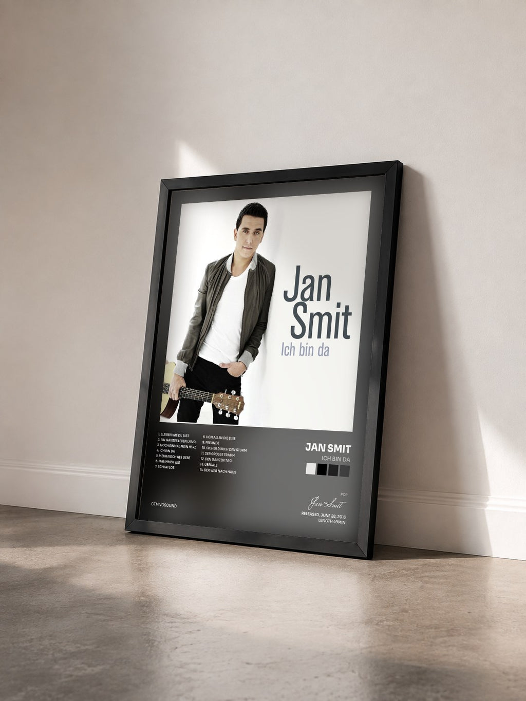 #noir Tableau de l'album Ich Bin Da de Jan Smit vu de trois quarts, cadre noir