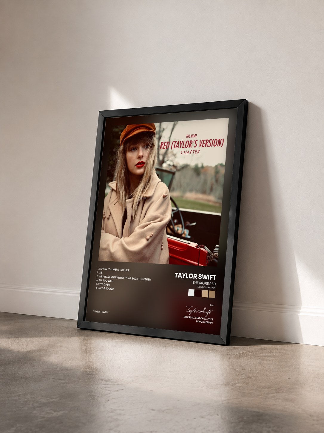 #noir Tableau de l'album The More Red (Taylor’s Version) Chapter de Taylor Swift vu de trois quarts, cadre noir