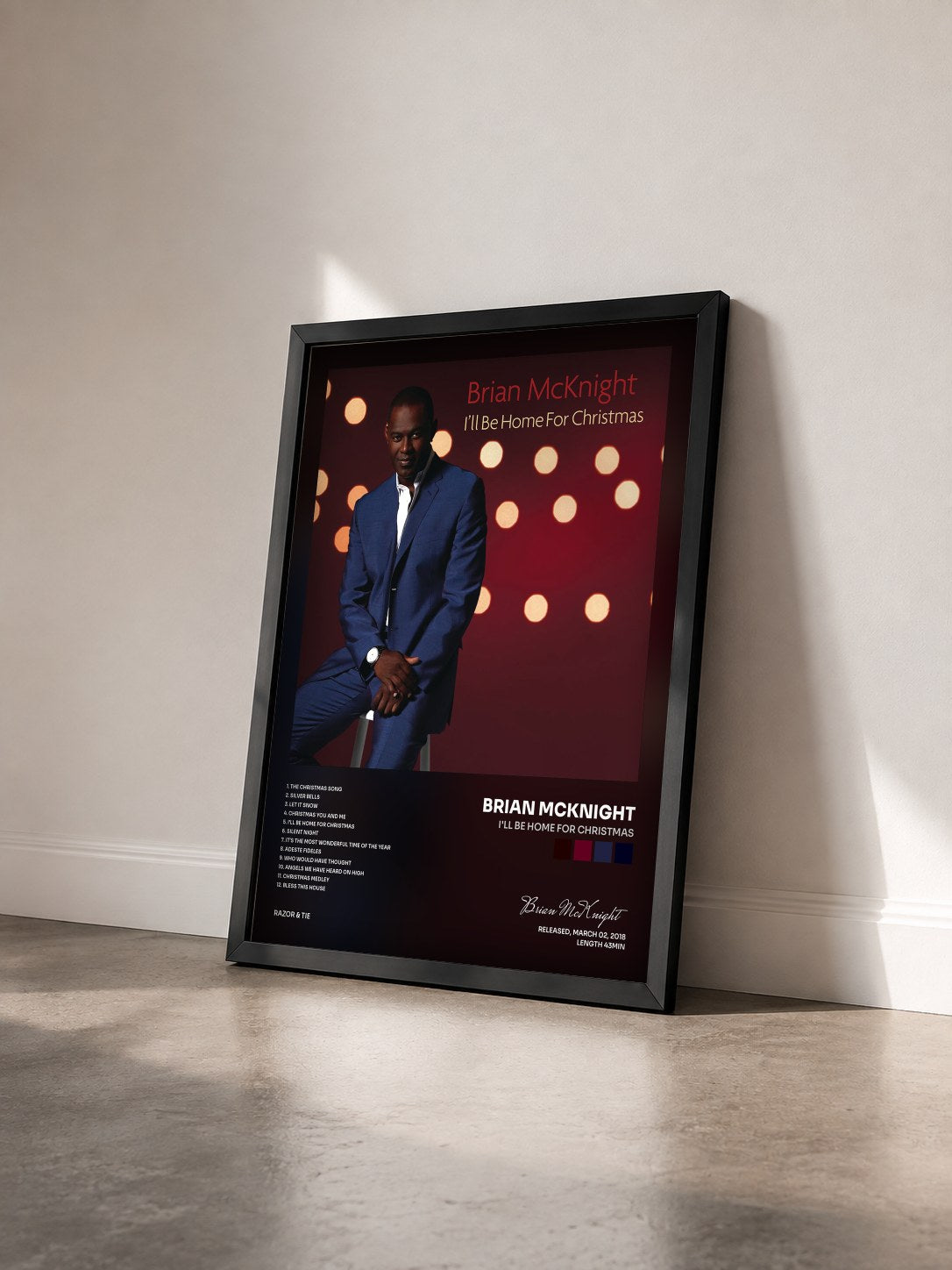 #noir Tableau de l'album I'll Be Home For Christmas de Brian McKnight vu de trois quarts, cadre noir