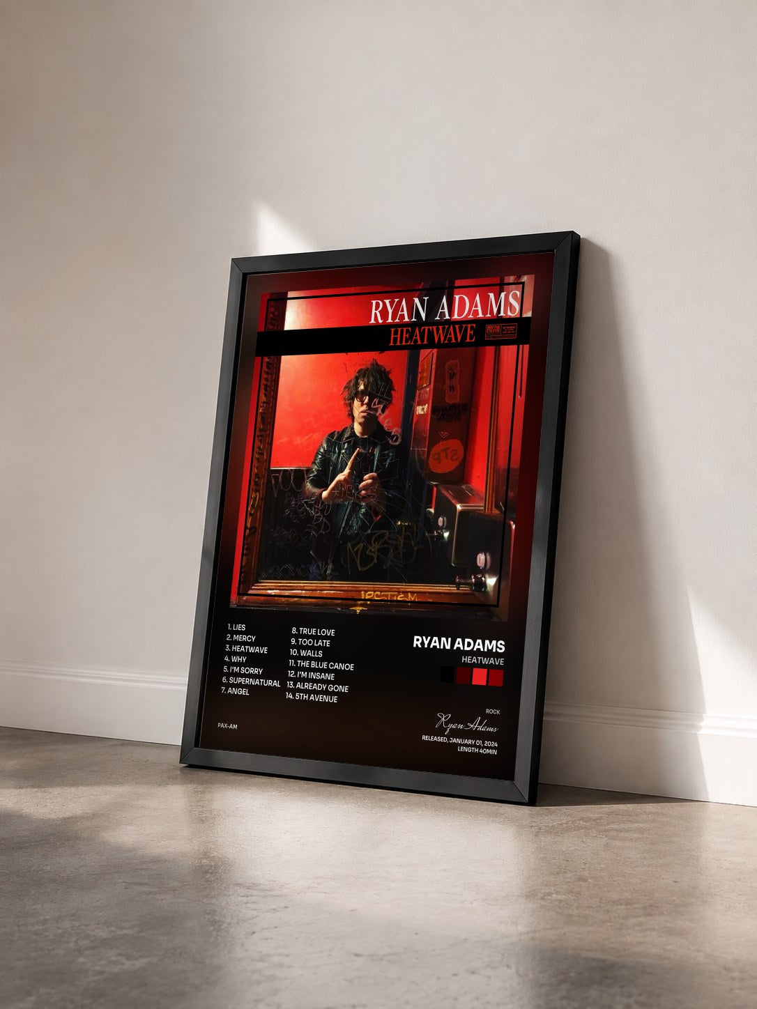 #noir Tableau de l'album Heatwave de Ryan Adams vu de trois quarts, cadre noir