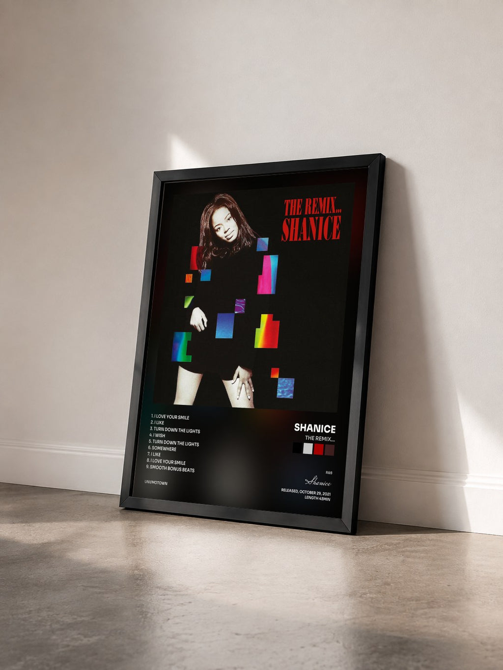 #noir Tableau de l'album The Remix... de Shanice vu de trois quarts, cadre noir