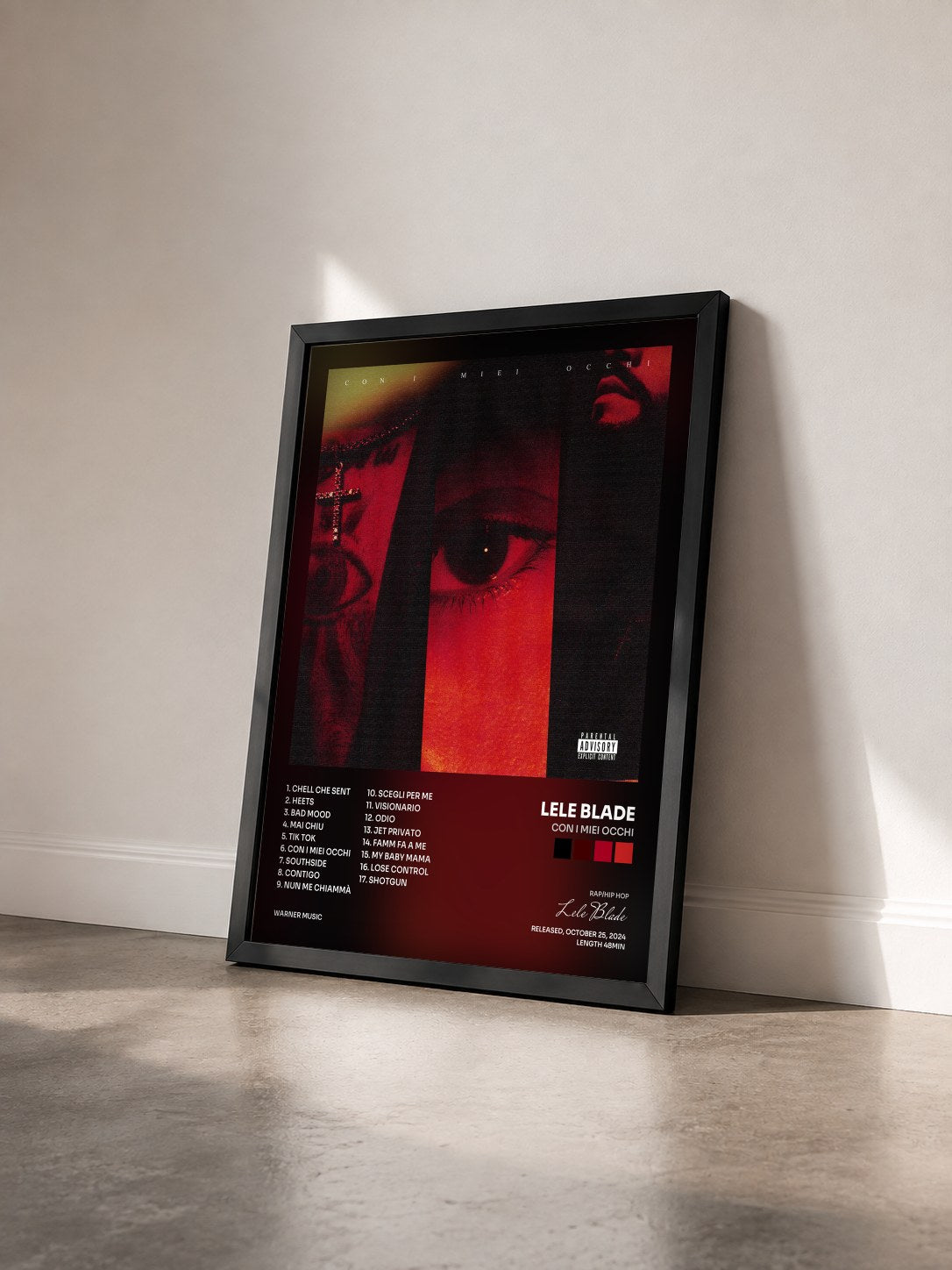 #noir Tableau de l'album CON I MIEI OCCHI de Lele Blade vu de trois quarts, cadre noir