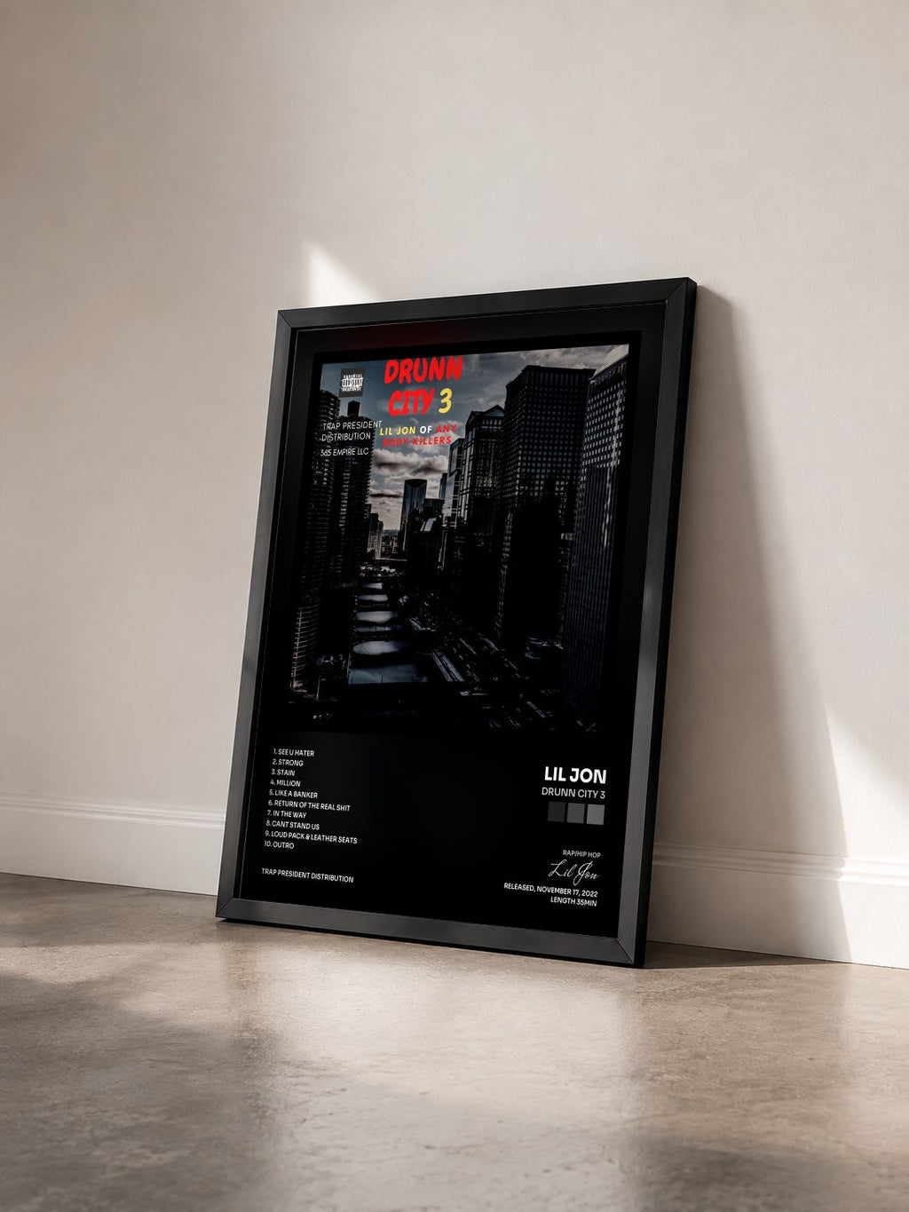 #noir Tableau de l'album Drunn City 3 de Lil Jon vu de trois quarts, cadre noir