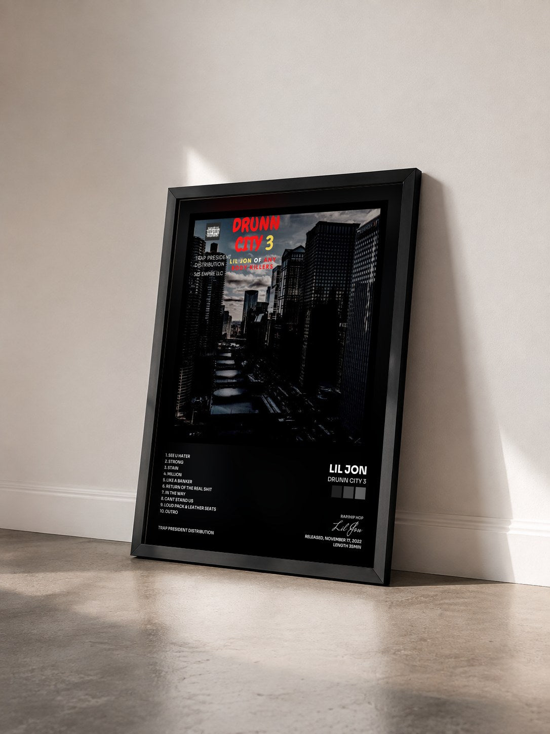 #noir Tableau de l'album Drunn City 3 de Lil Jon vu de trois quarts, cadre noir