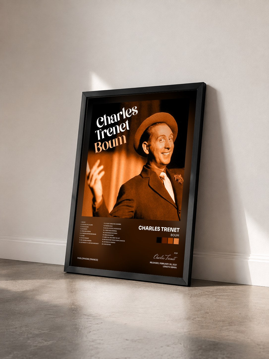 #noir Tableau de l'album Boum de Charles Trenet vu de trois quarts, cadre noir