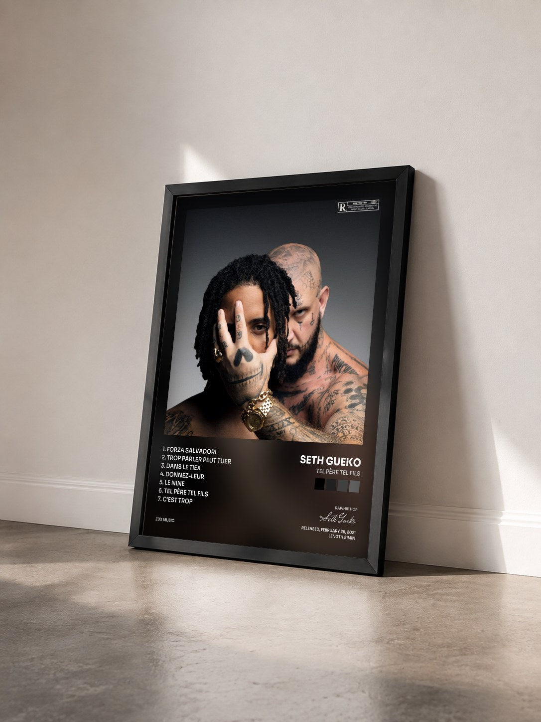 #noir Tableau de l'album Tel père tel fils de Seth Gueko vu de trois quarts, cadre noir