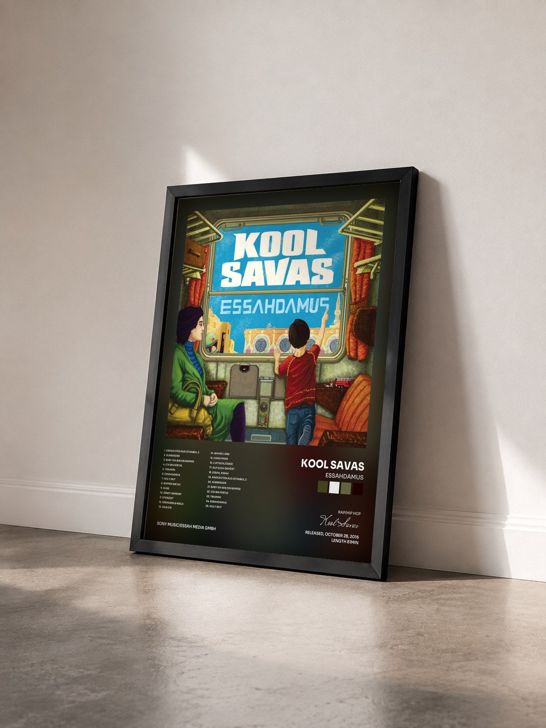 #noir Tableau de l'album Essahdamus de Kool Savas vu de trois quarts, cadre noir