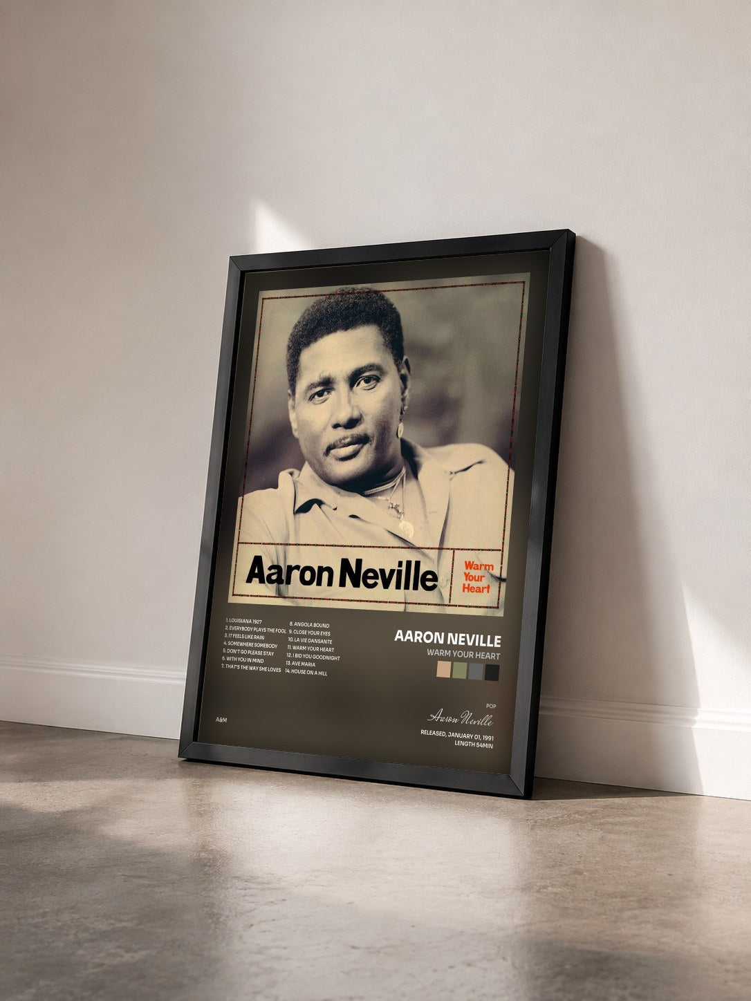 #noir Tableau de l'album Warm Your Heart de Aaron Neville vu de trois quarts, cadre noir