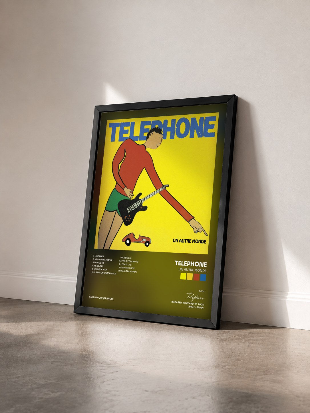 #noir Tableau de l'album Un Autre Monde de Telephone vu de trois quarts, cadre noir