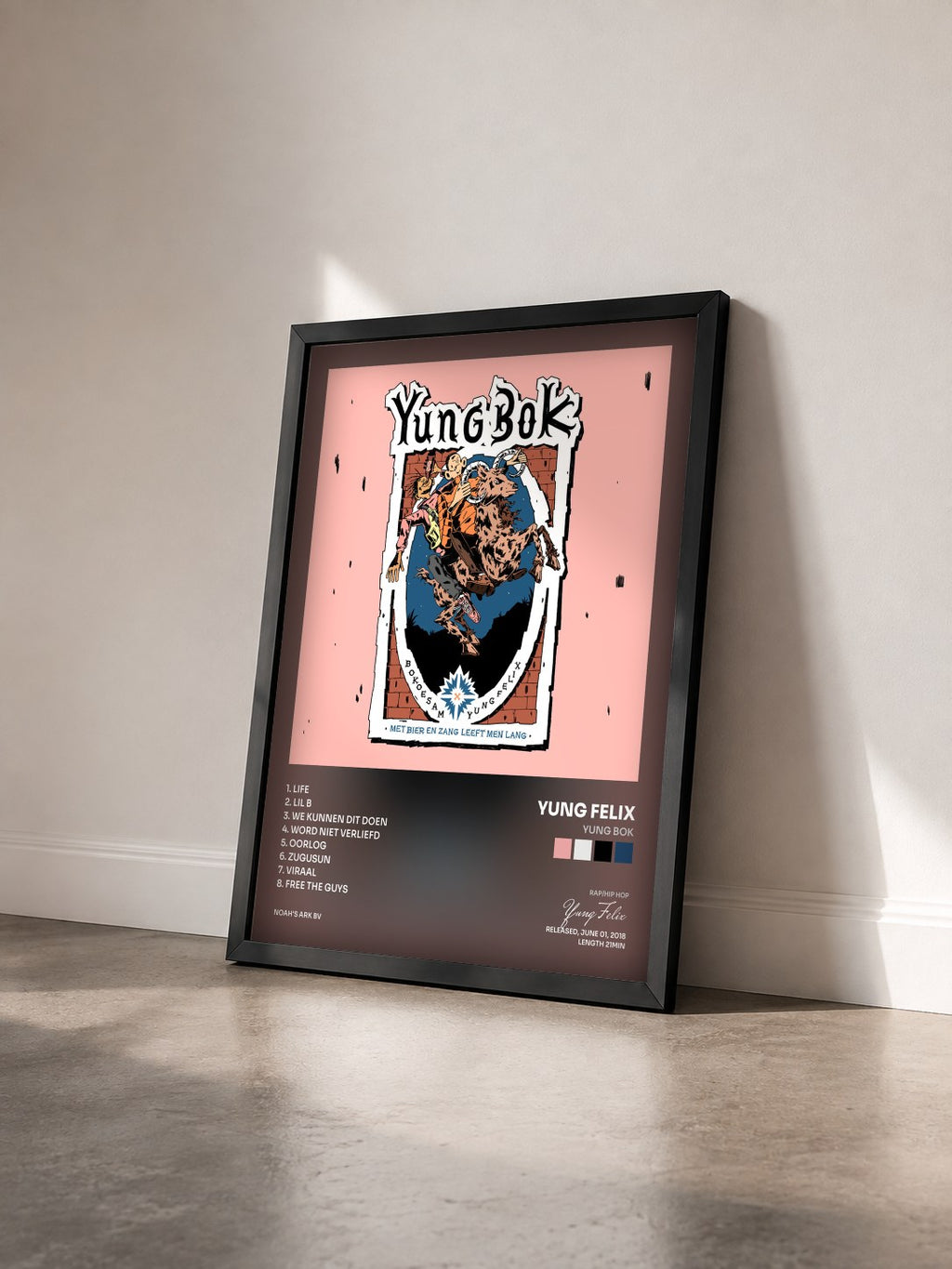 #noir Tableau de l'album Yung Bok de Yung Felix vu de trois quarts, cadre noir