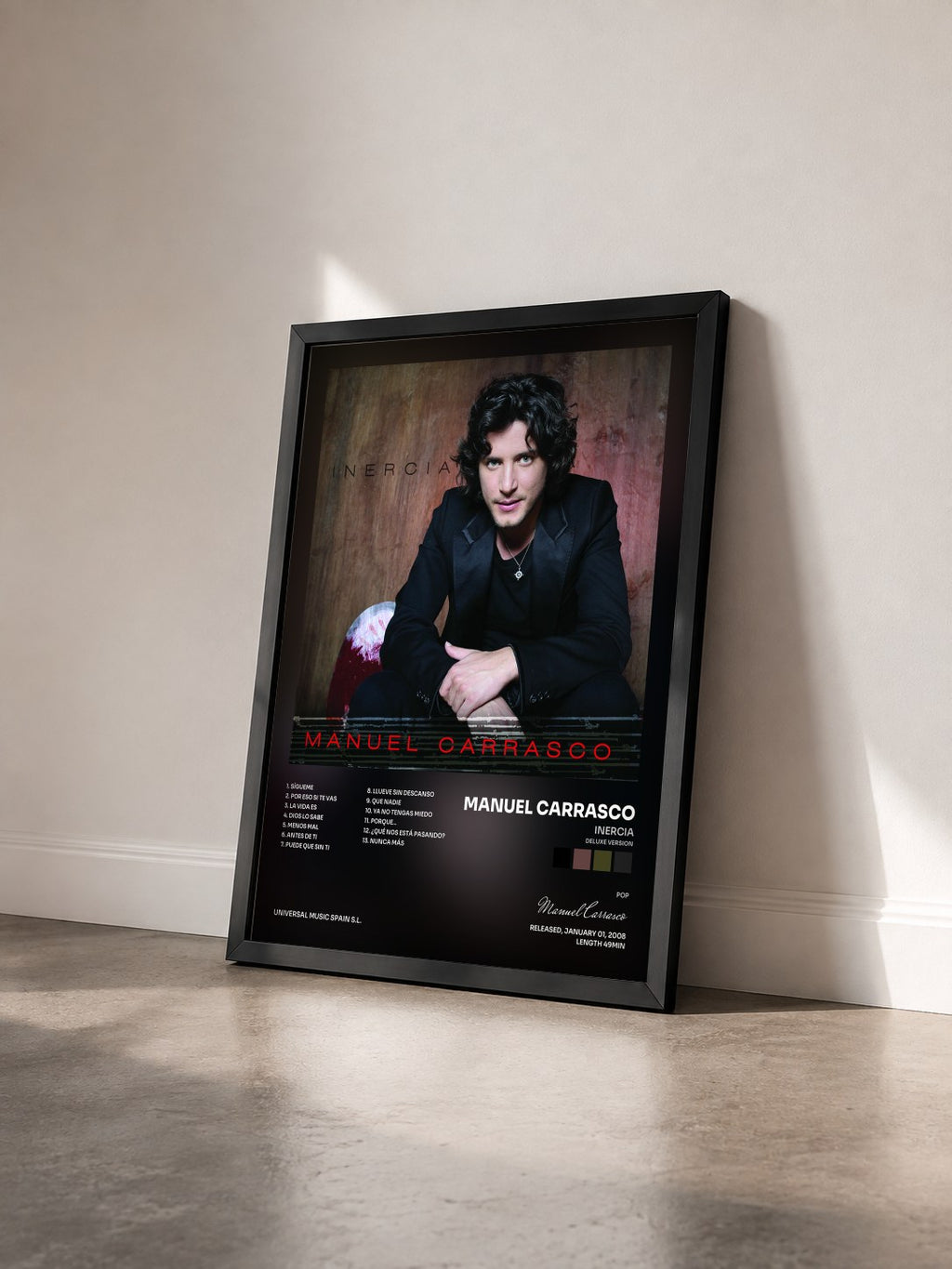 #noir Tableau de l'album Inercia (Deluxe Version) de Manuel Carrasco vu de trois quarts, cadre noir