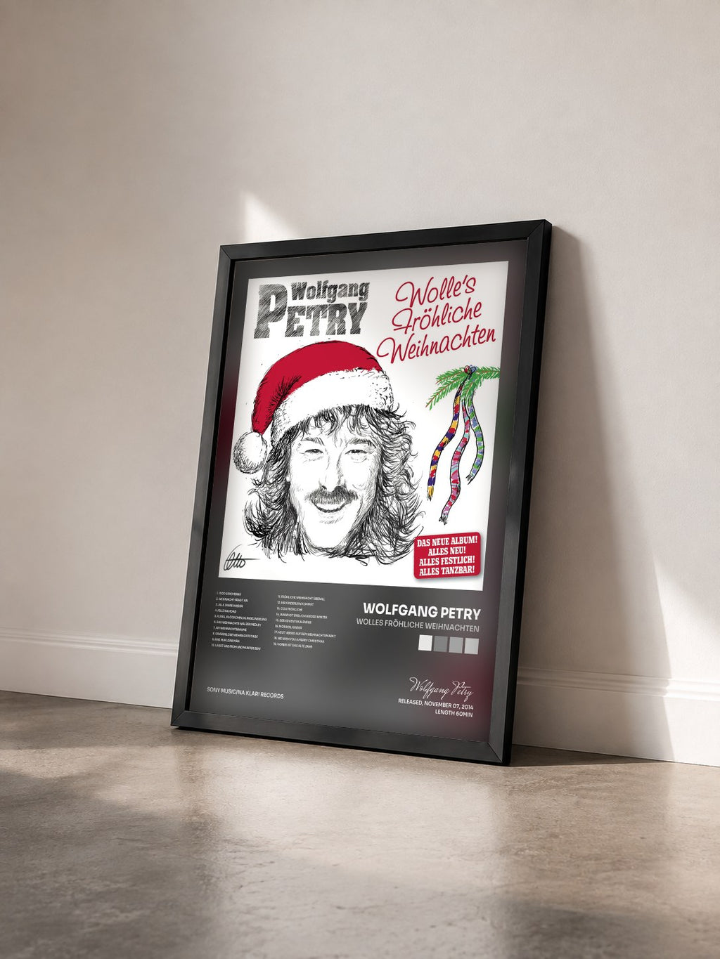 #noir Tableau de l'album Wolles Fröhliche Weihnachten de Wolfgang Petry vu de trois quarts, cadre noir