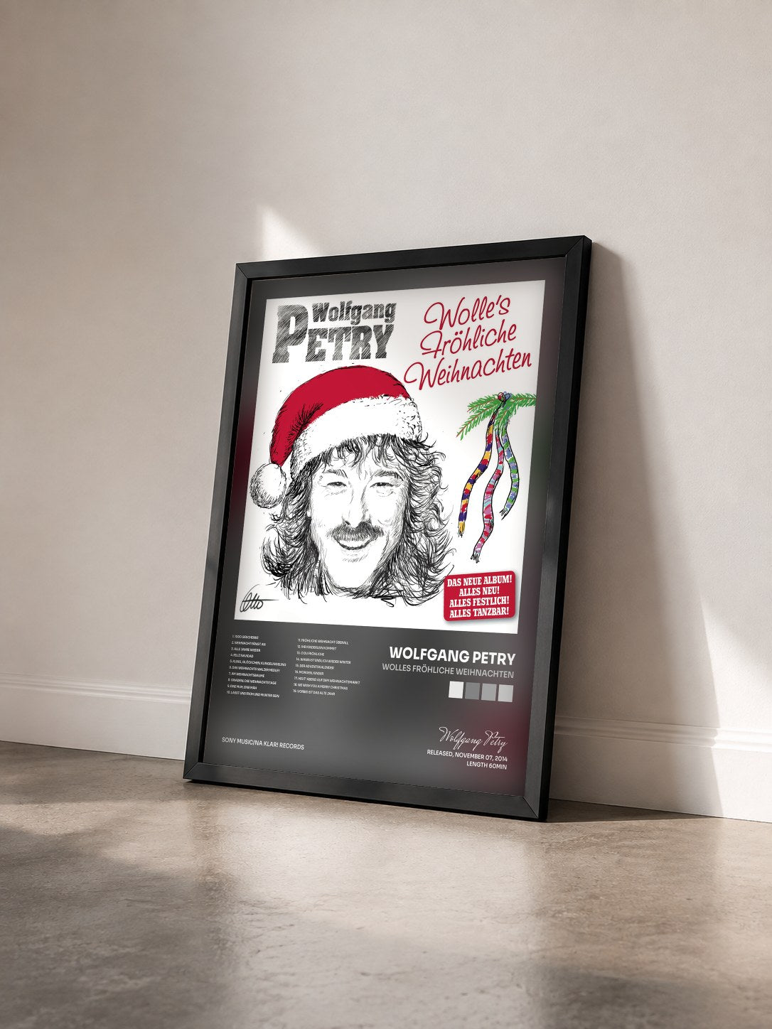 #noir Tableau de l'album Wolles Fröhliche Weihnachten de Wolfgang Petry vu de trois quarts, cadre noir