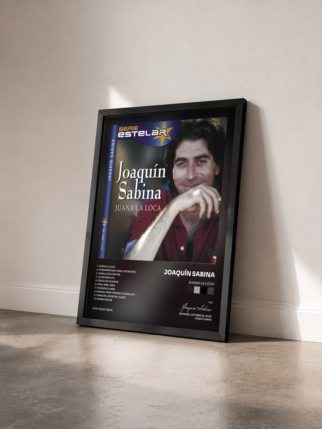 #noir Tableau de l'album Juana La Loca de Joaquín Sabina vu de trois quarts, cadre noir