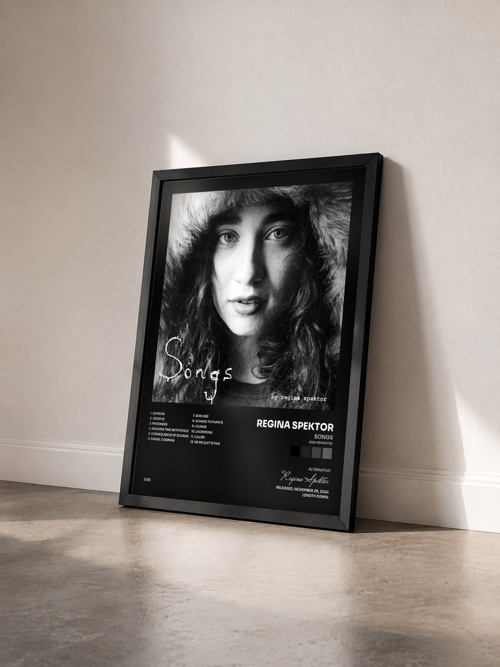 #noir Tableau de l'album Songs (2024 Remaster) de Regina Spektor vu de trois quarts, cadre noir
