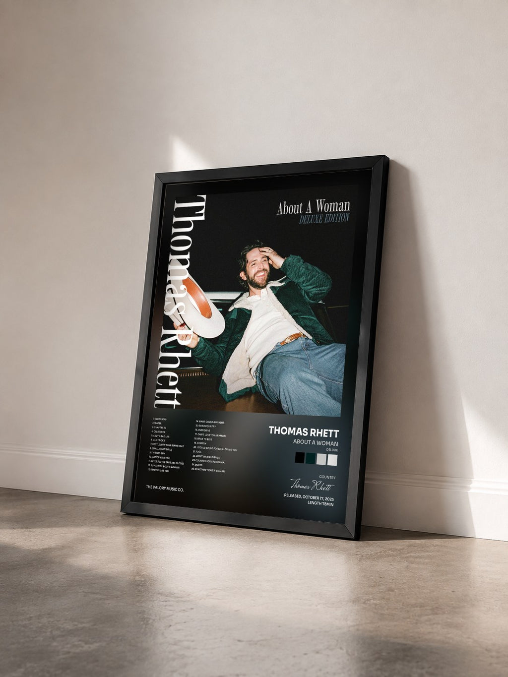 #noir Tableau de l'album About A Woman (Deluxe) de Thomas Rhett vu de trois quarts, cadre noir