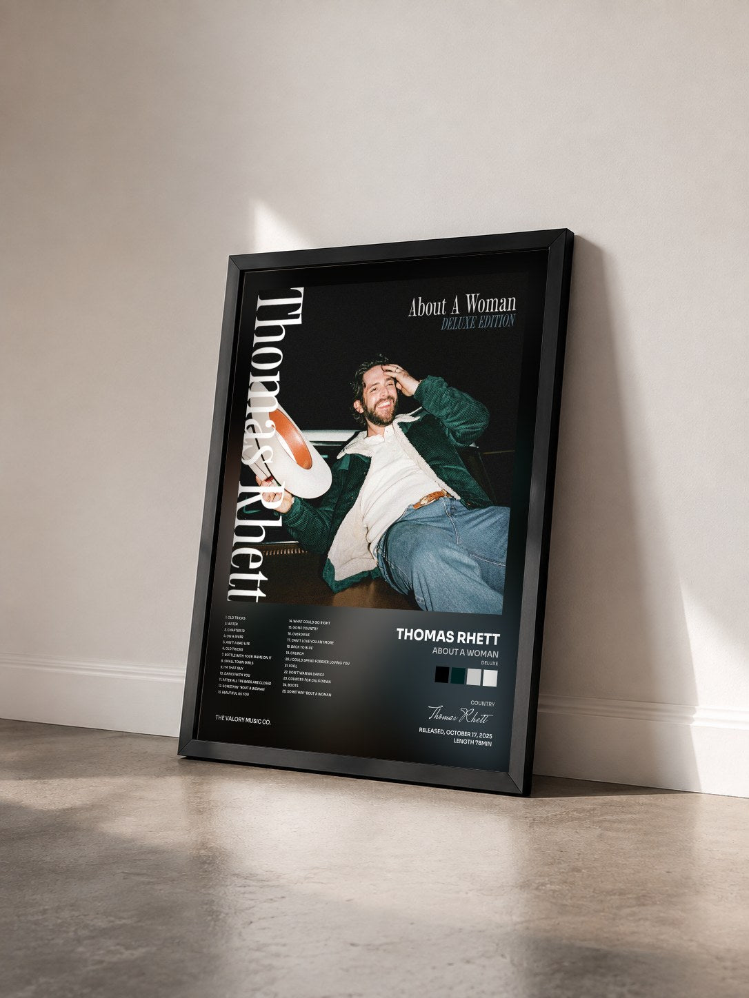 #noir Tableau de l'album About A Woman (Deluxe) de Thomas Rhett vu de trois quarts, cadre noir