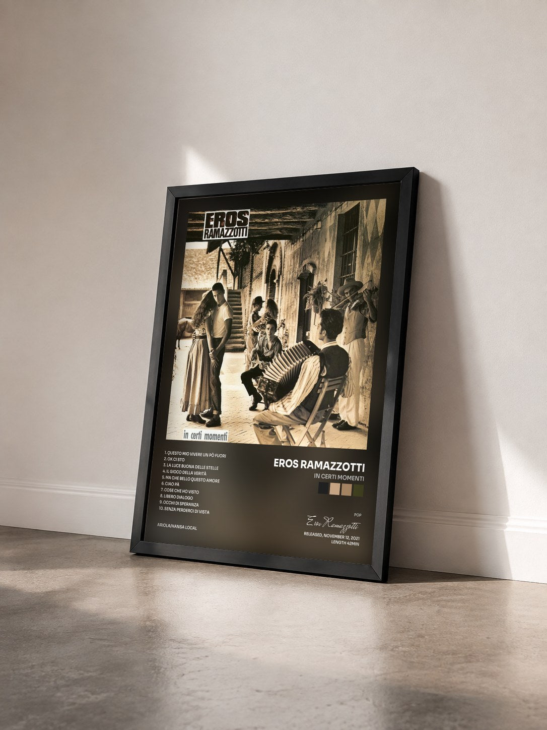 #noir Tableau de l'album In certi momenti de Eros Ramazzotti vu de trois quarts, cadre noir