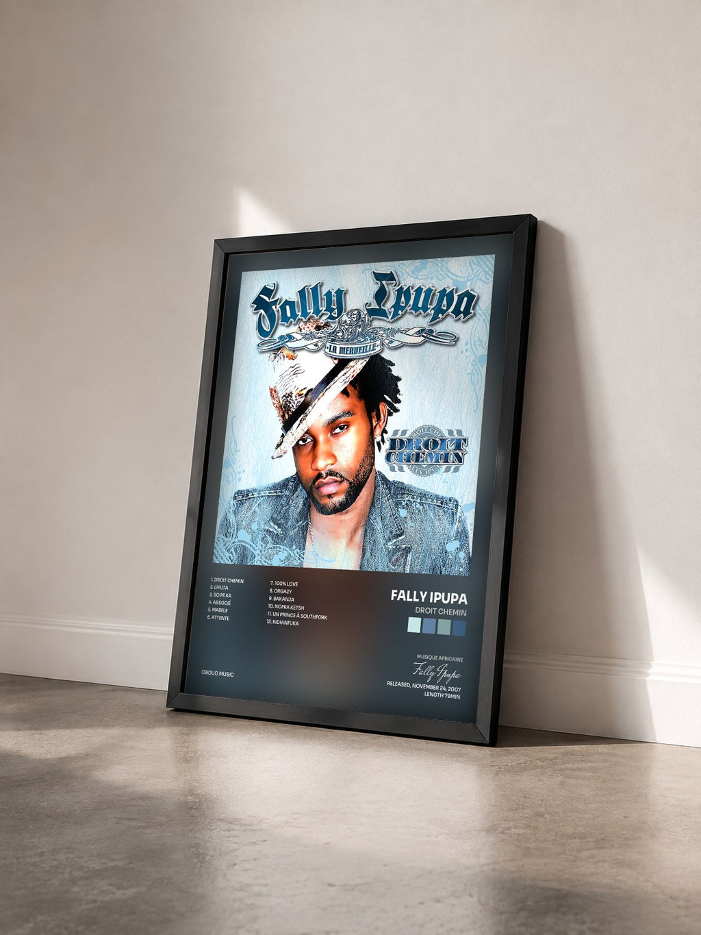 #noir Tableau de l'album Droit Chemin de Fally Ipupa vu de trois quarts, cadre noir