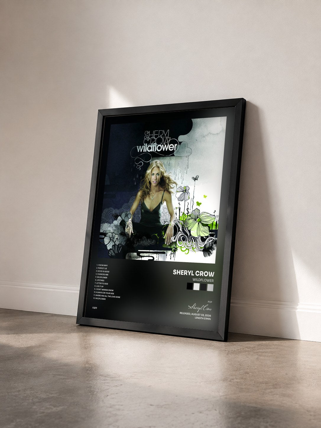#noir Tableau de l'album Wildflower de Sheryl Crow vu de trois quarts, cadre noir