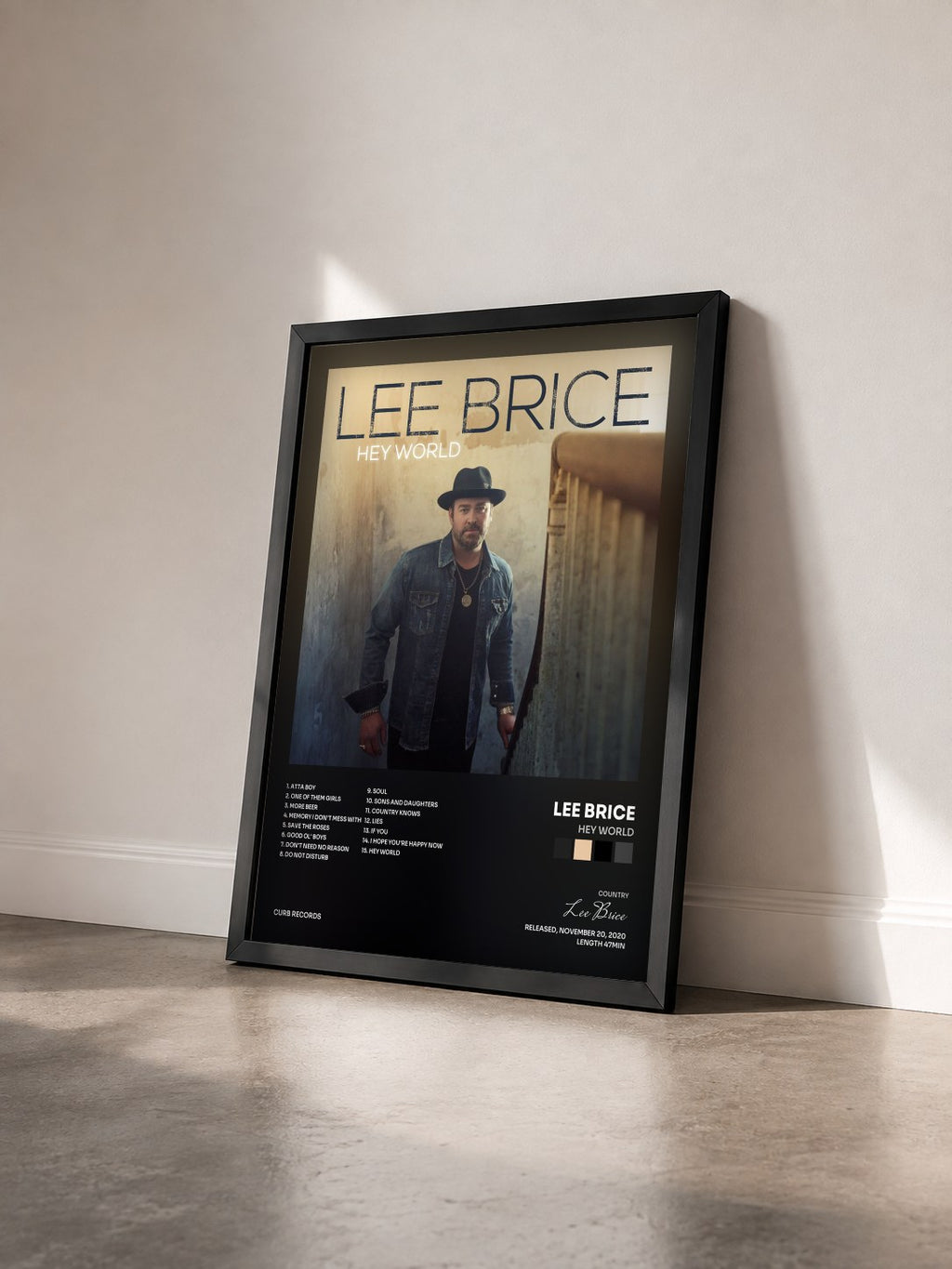 #noir Tableau de l'album Hey World de Lee Brice vu de trois quarts, cadre noir