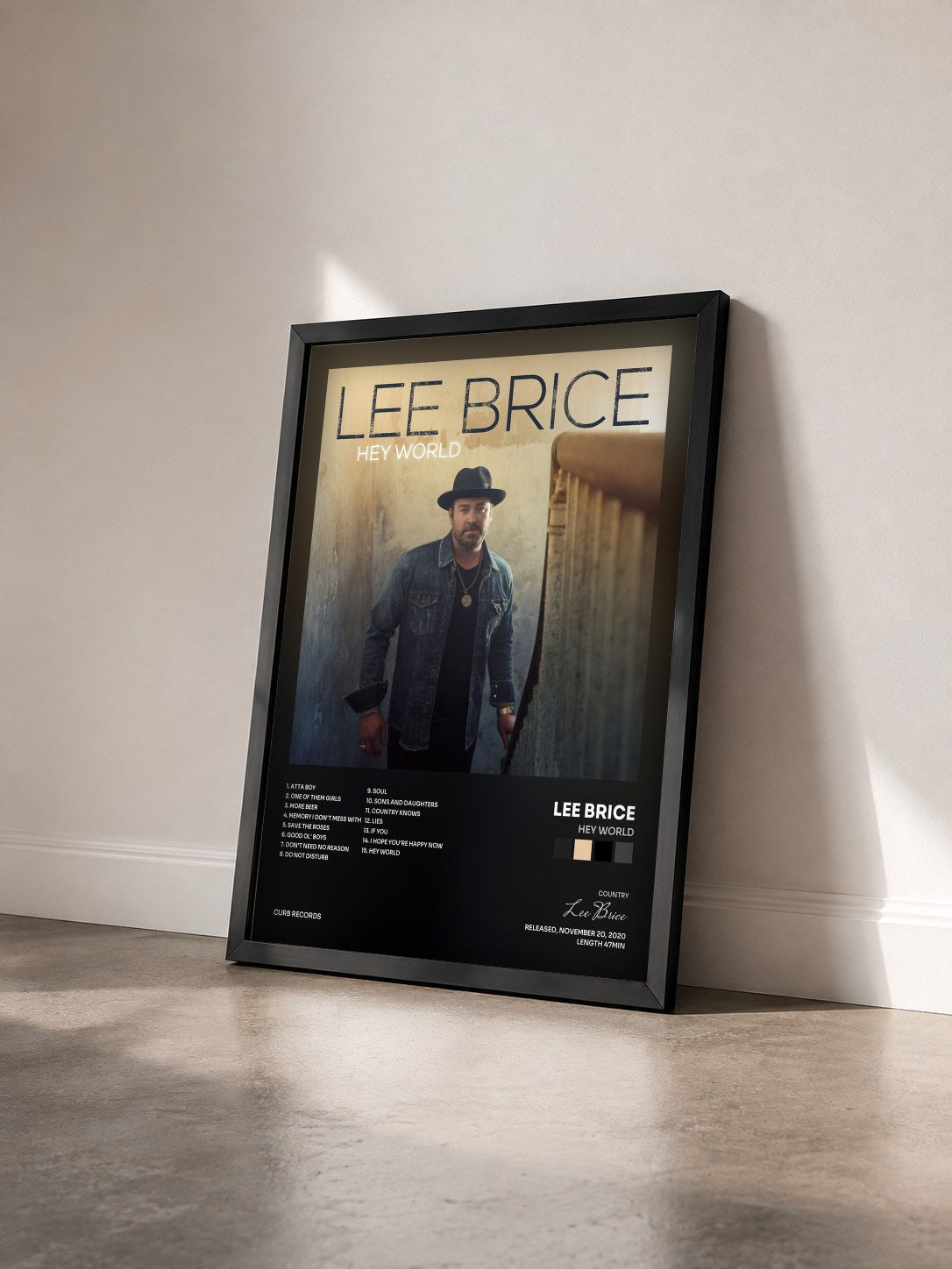 #noir Tableau de l'album Hey World de Lee Brice vu de trois quarts, cadre noir