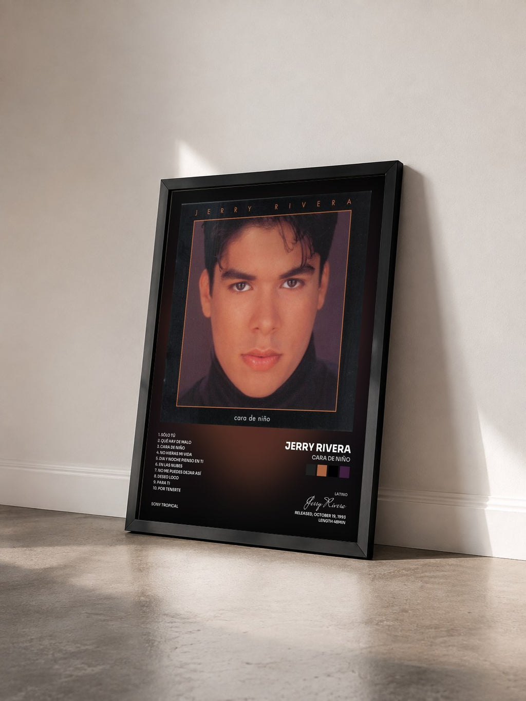 #noir Tableau de l'album Cara De Niño de Jerry Rivera vu de trois quarts, cadre noir