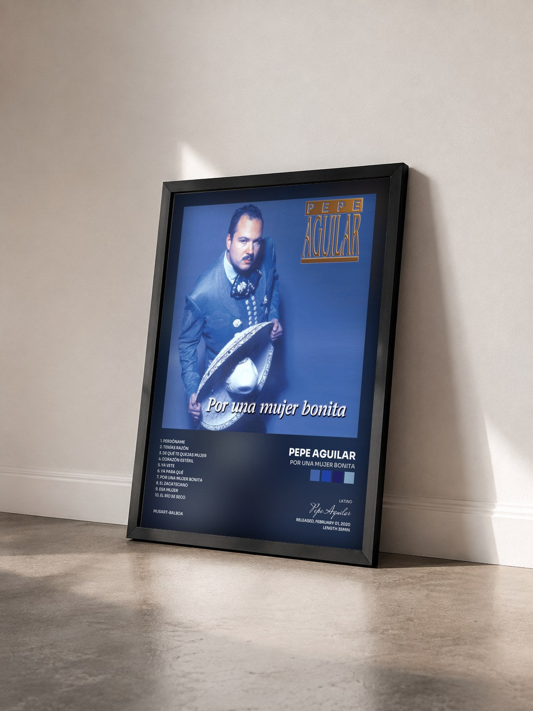 #noir Tableau de l'album Por Una Mujer Bonita de Pepe Aguilar vu de trois quarts, cadre noir