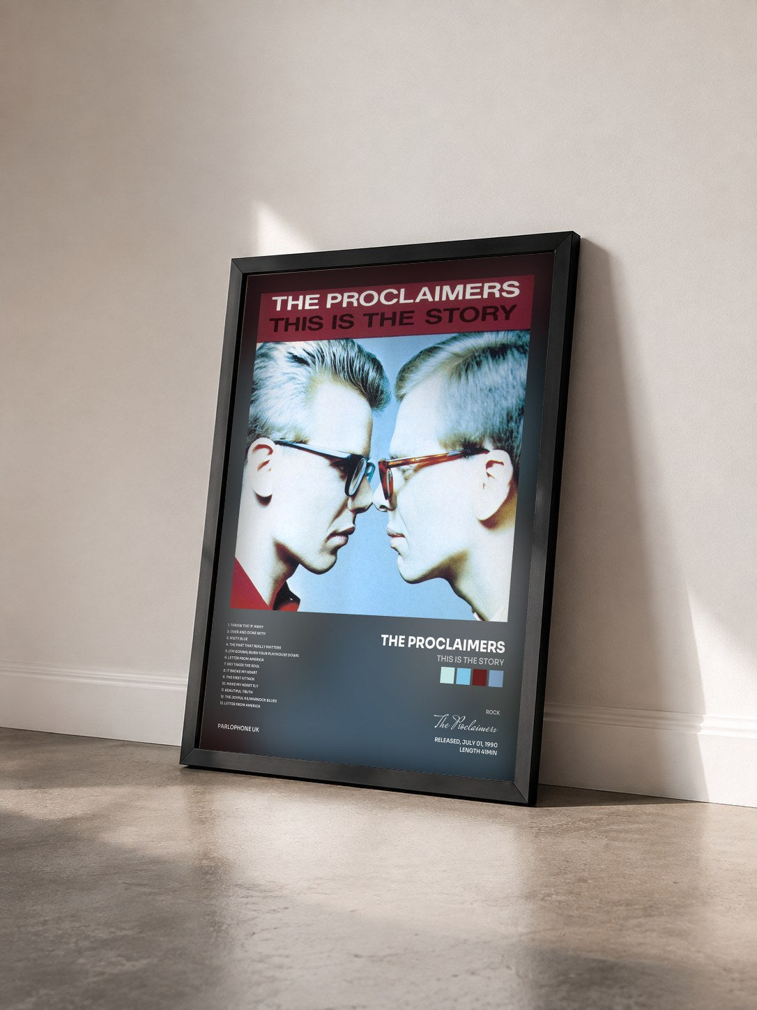 #noir Tableau de l'album This Is the Story de The Proclaimers vu de trois quarts, cadre noir