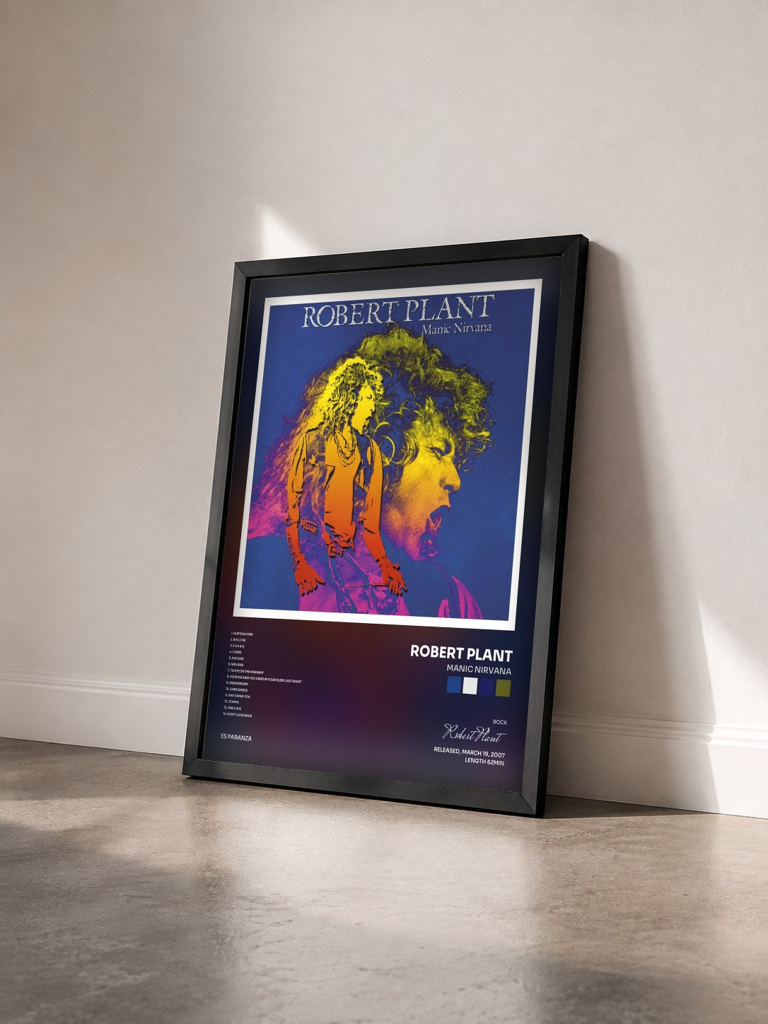 #noir Tableau de l'album Manic Nirvana de Robert Plant vu de trois quarts, cadre noir