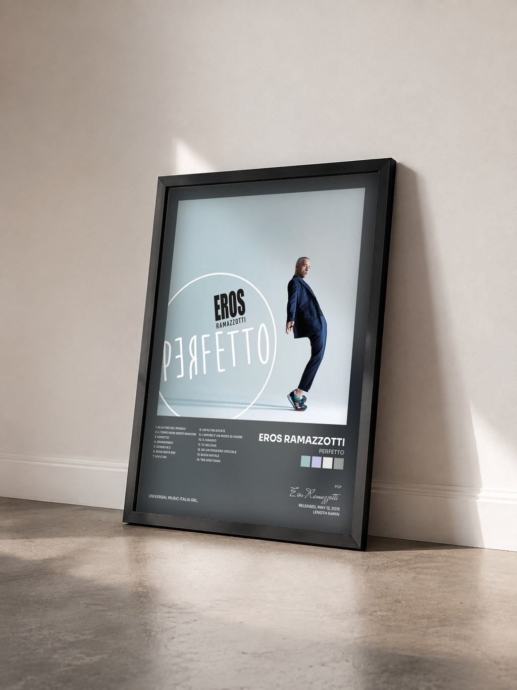 #noir Tableau de l'album Perfetto de Eros Ramazzotti vu de trois quarts, cadre noir