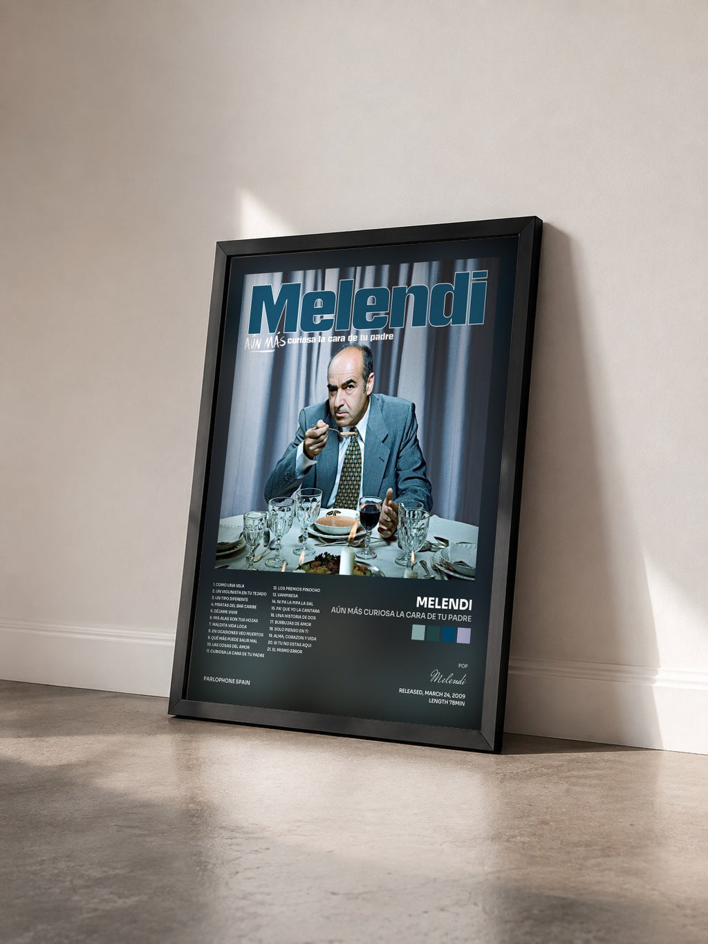 #noir Tableau de l'album Aún Más Curiosa La Cara De Tu Padre de Melendi vu de trois quarts, cadre noir