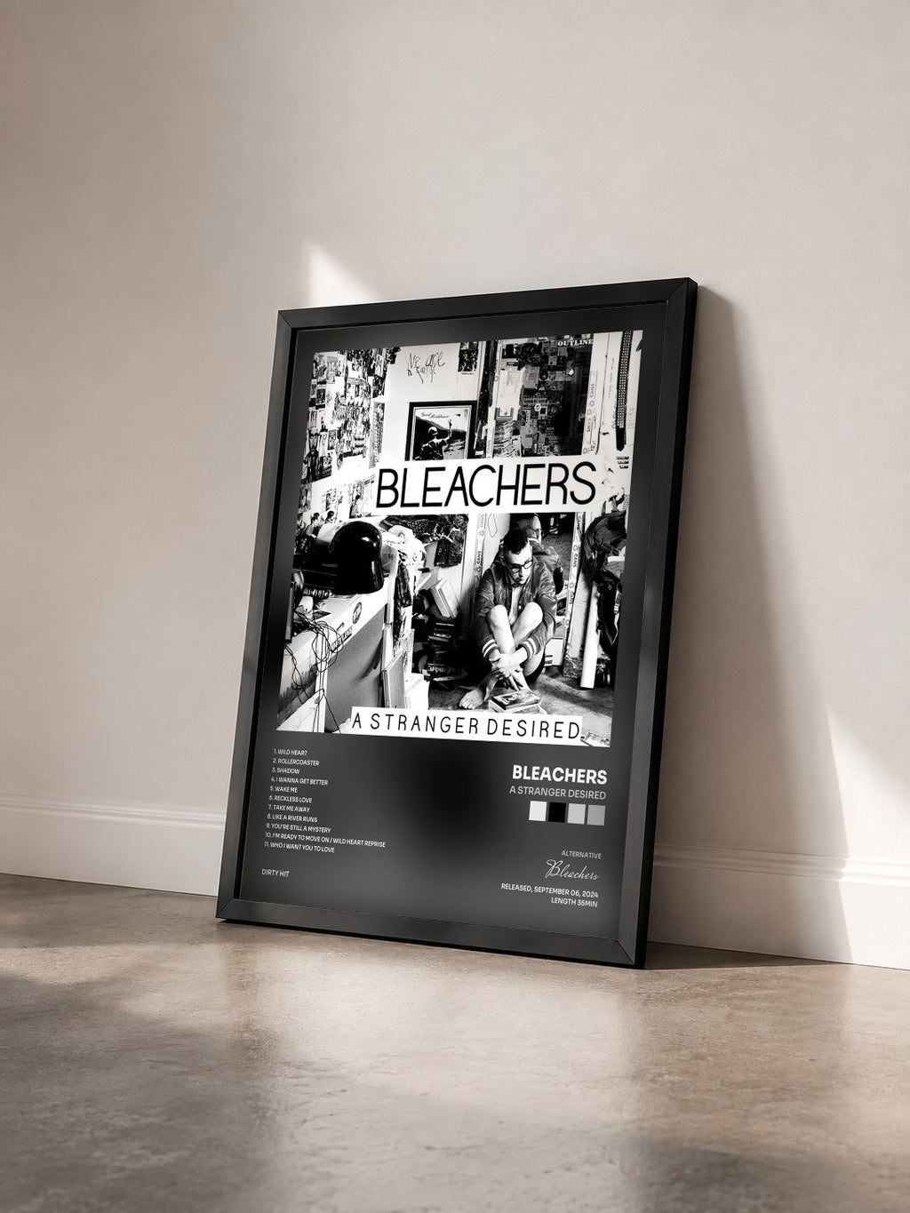 #noir Tableau de l'album A Stranger Desired de Bleachers vu de trois quarts, cadre noir