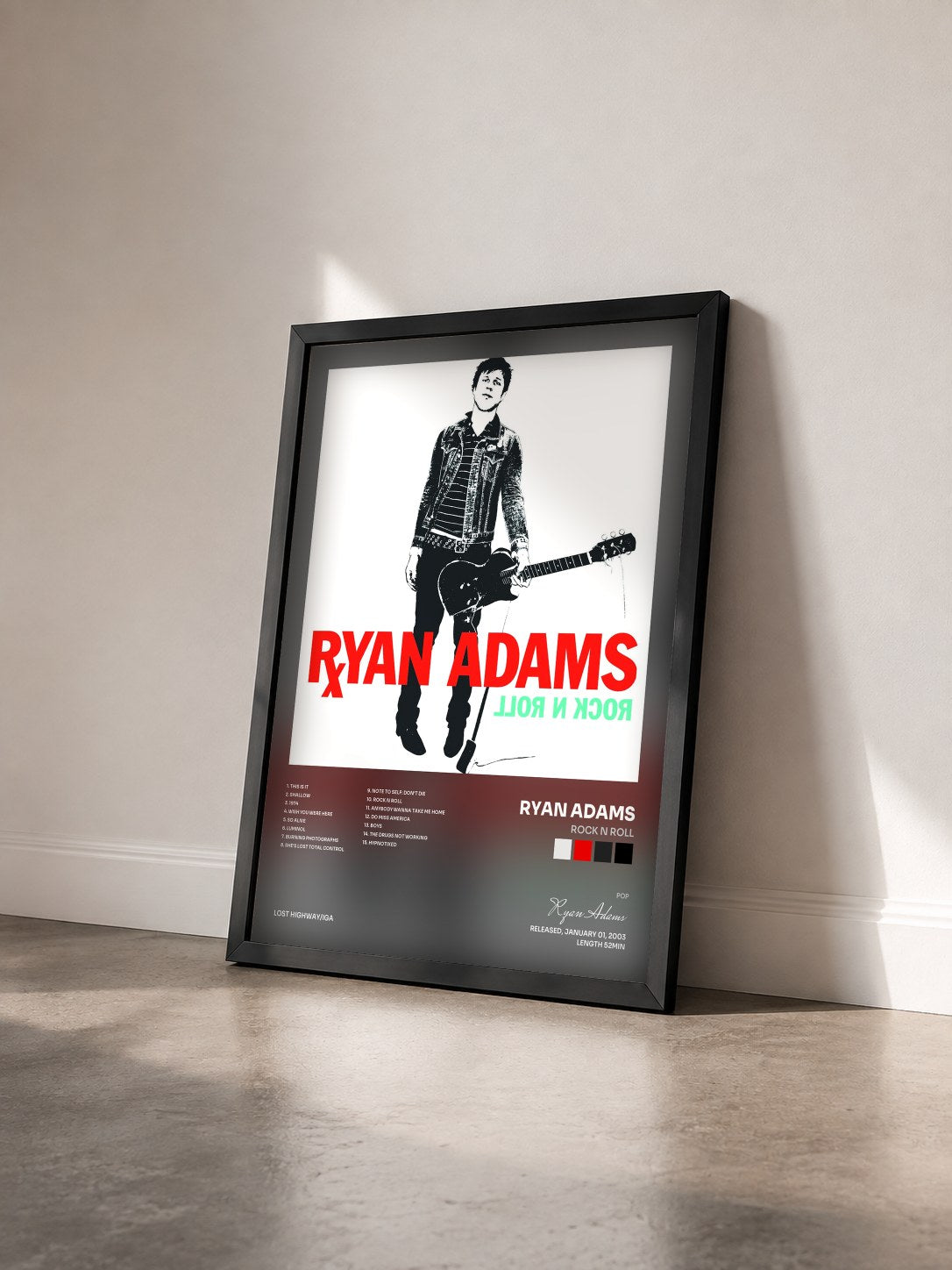 #noir Tableau de l'album Rock N Roll de Ryan Adams vu de trois quarts, cadre noir