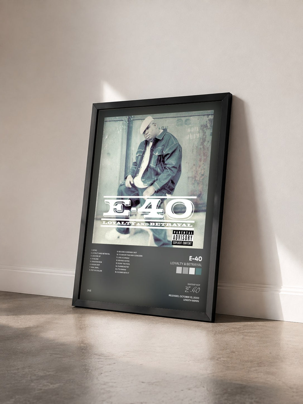 #noir Tableau de l'album Loyalty & Betrayal de E-40 vu de trois quarts, cadre noir